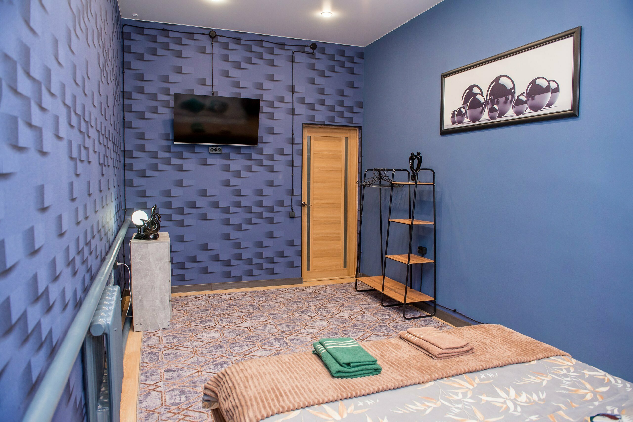 Двухместный номер с двуспальной кроватью и дополнительной кроватью