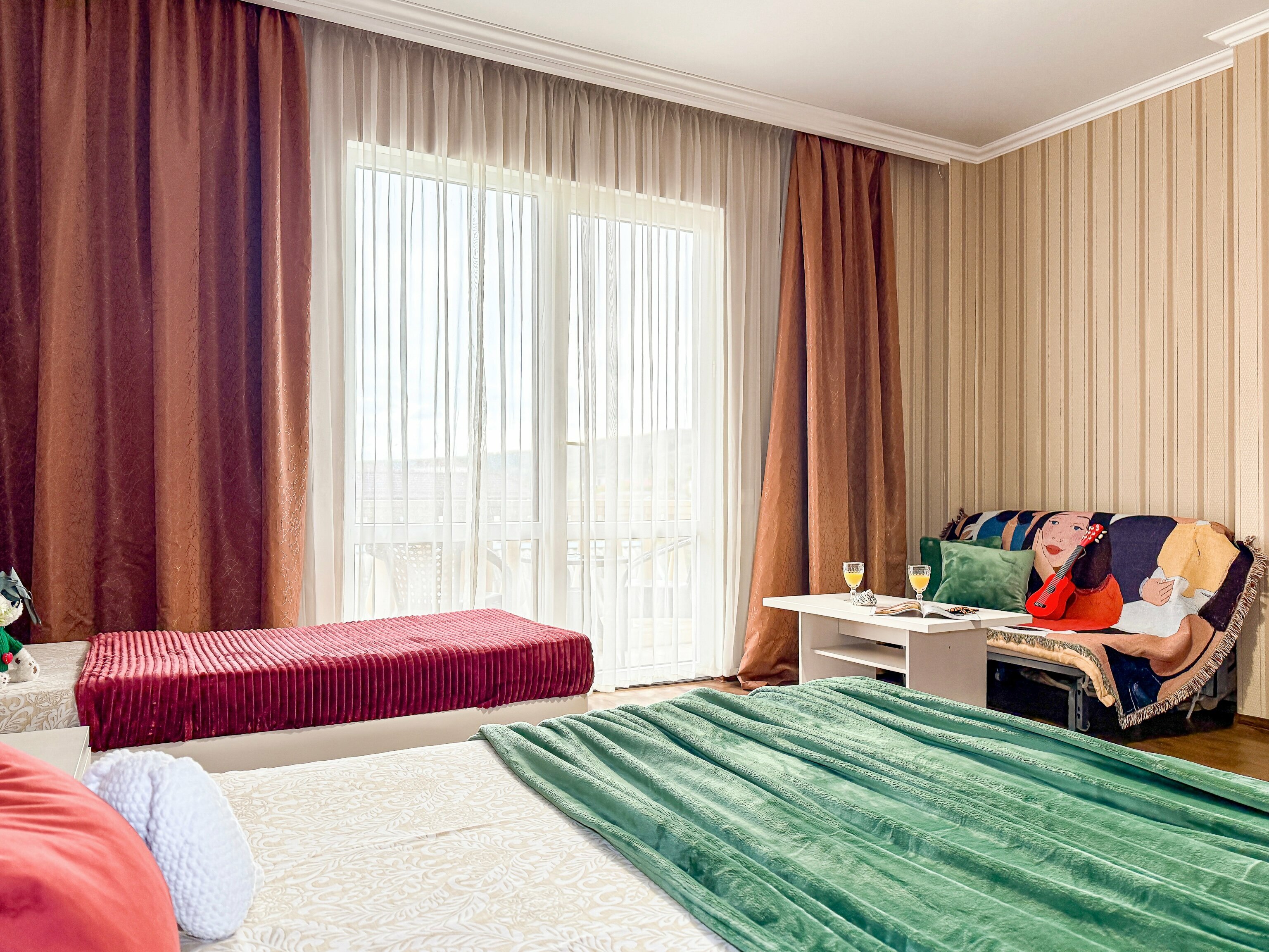 Четырехместный номер Делюкс