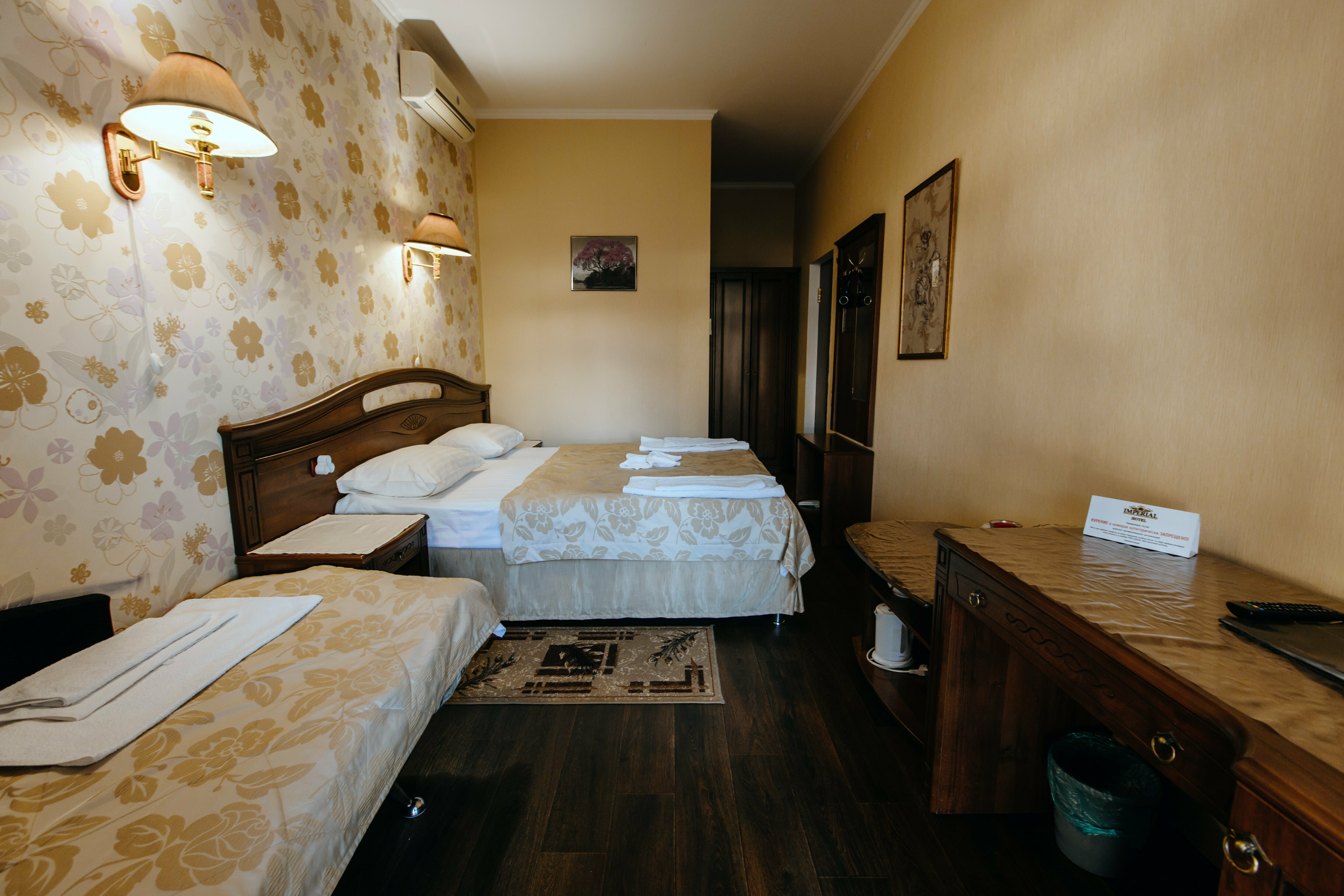 Улучшенный трехместный номер с балконом