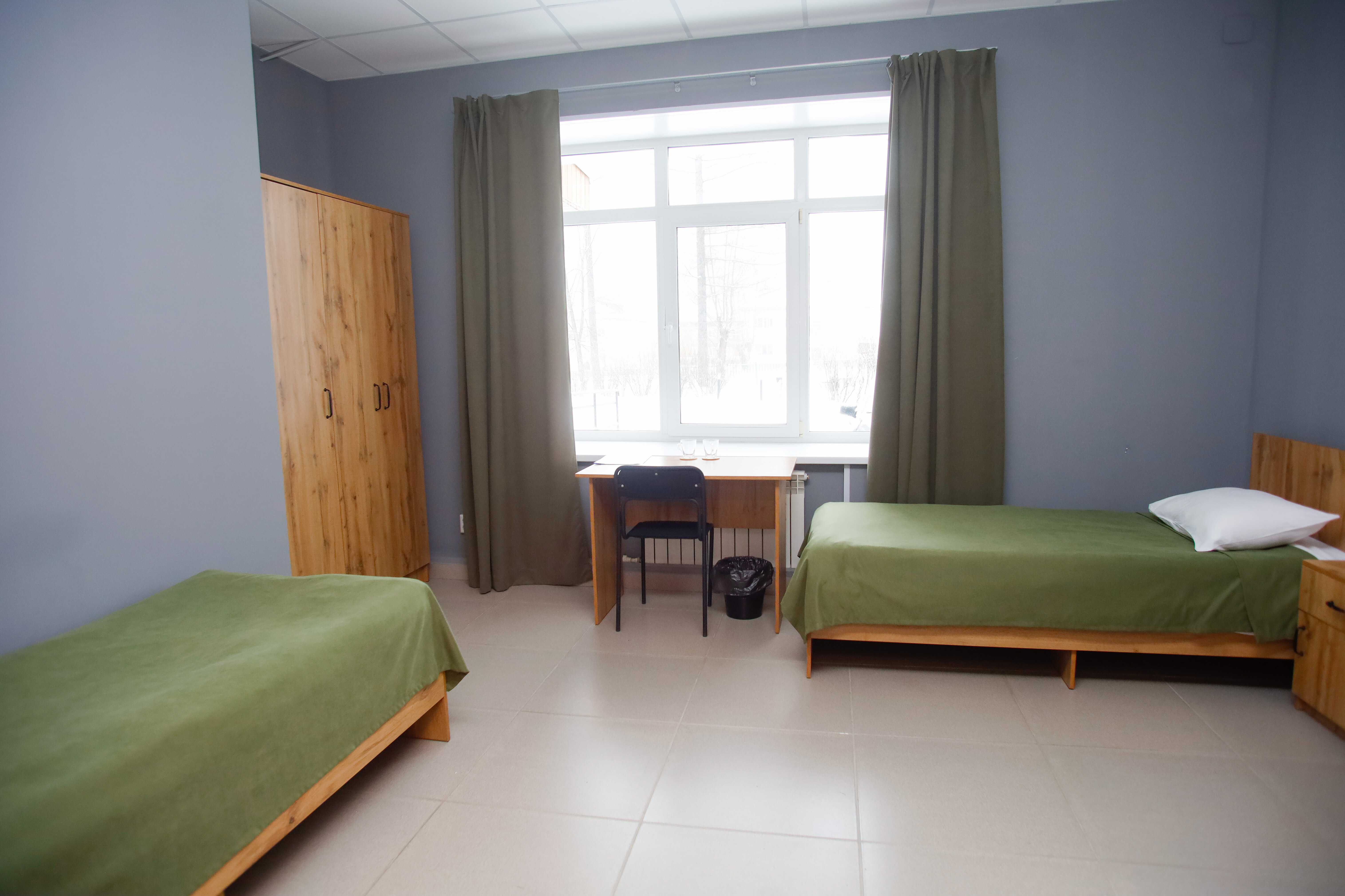 Двухместный номер с 2 отдельными кроватями и общим туалетом