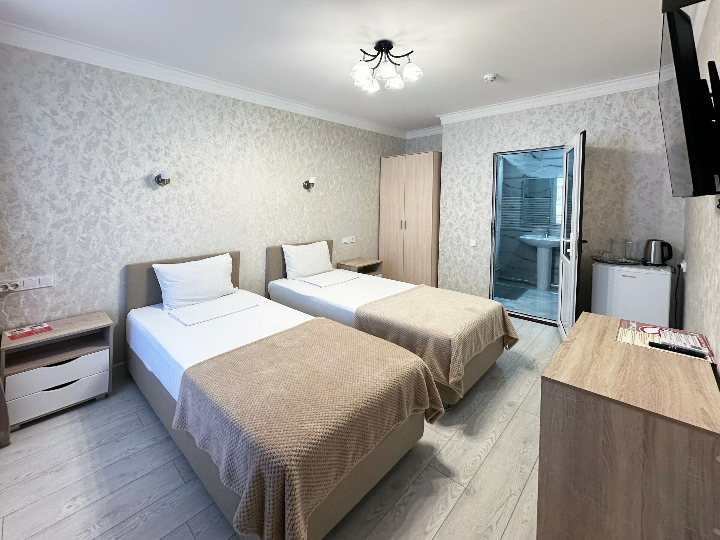 Двухместный номер с 2 отдельными кроватями и душем