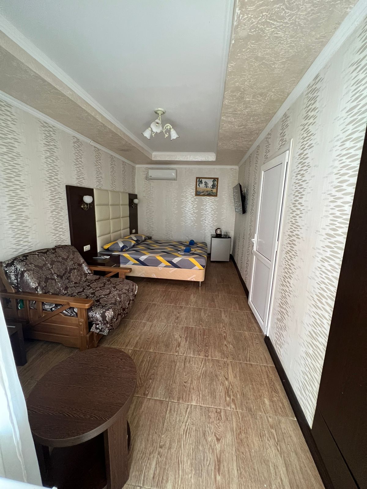 Трехместный номер Делюкс