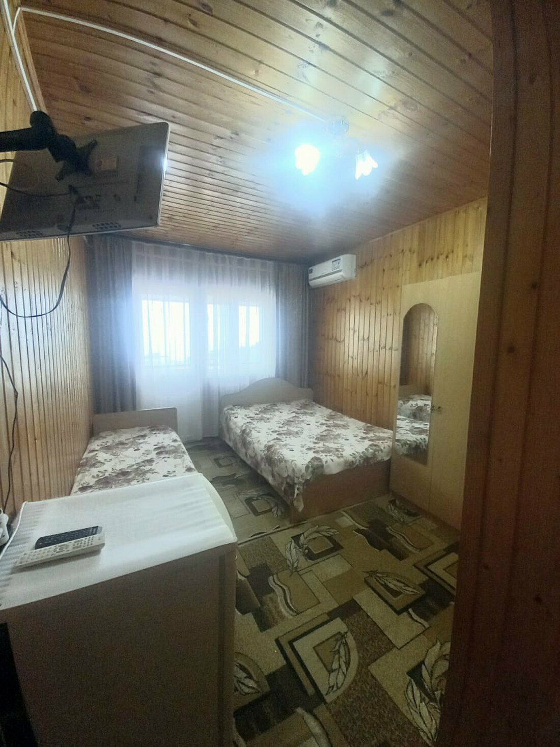 Трехместный номер с балконом