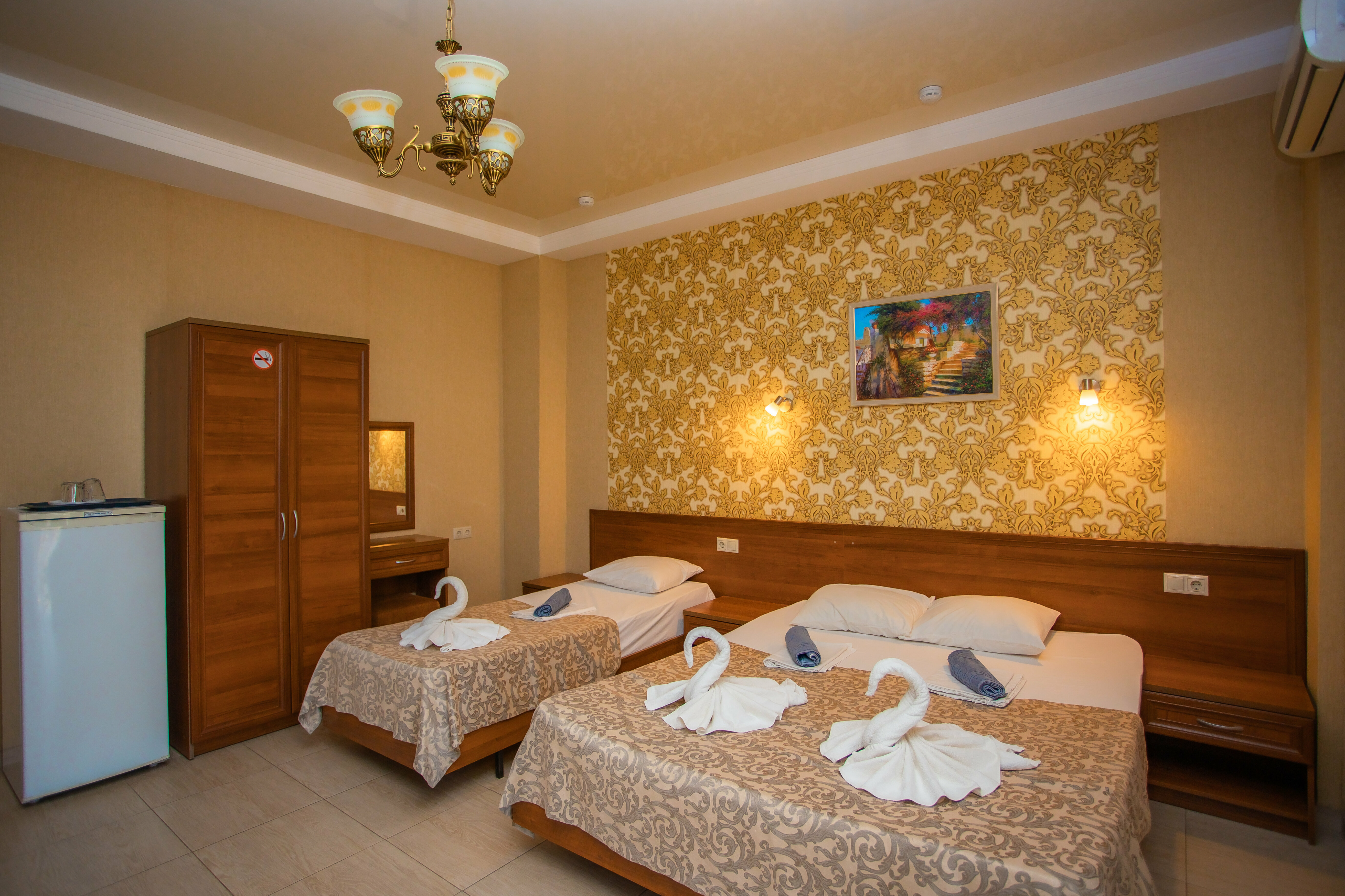 Трехместный номер с балконом