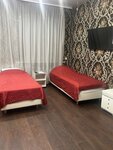 Стандартный четырехместный номер в AirPort City Lodge