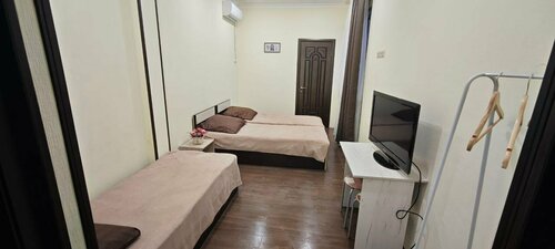 Трехместный номер с основными удобствами в ТриДом