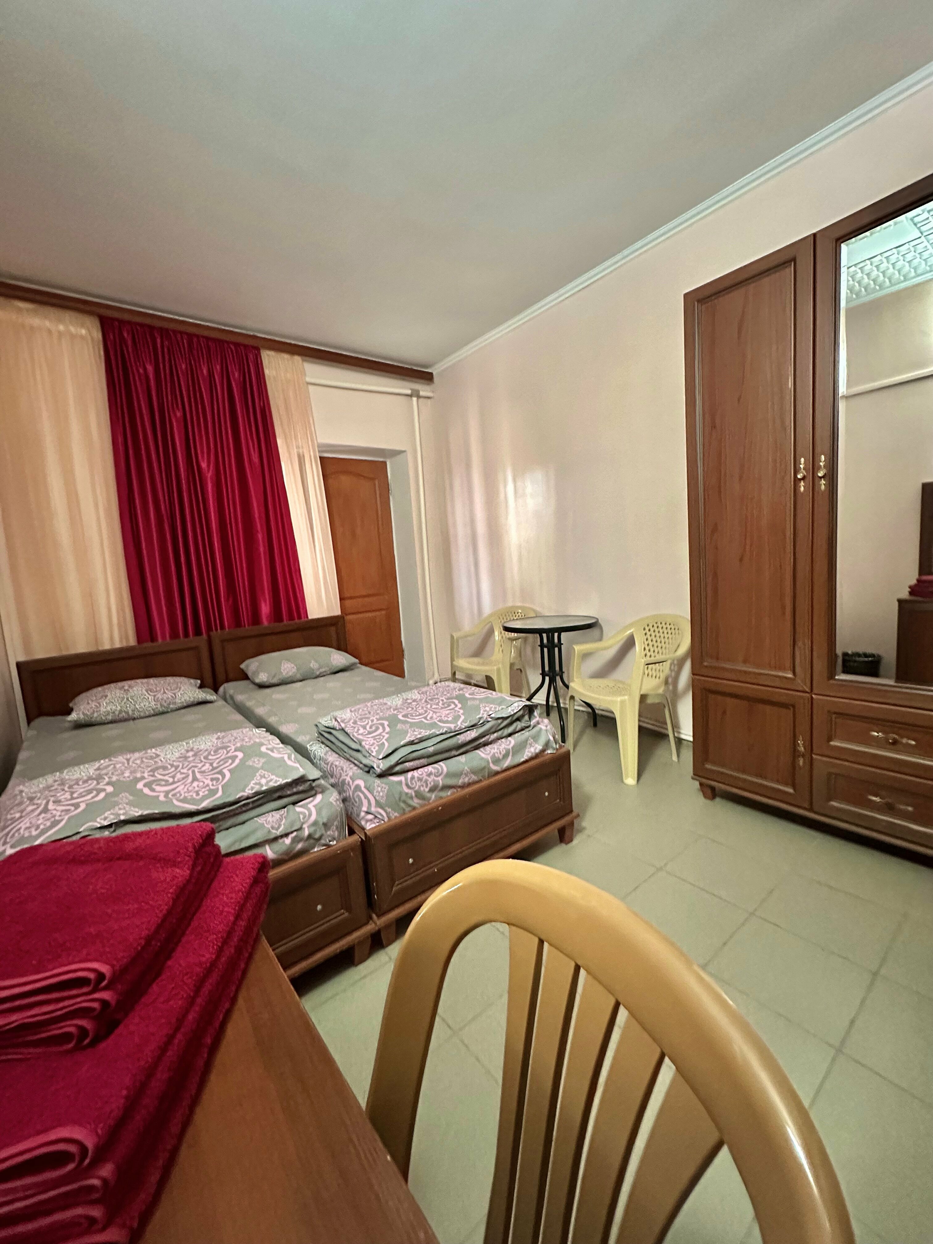 Двухместный номер с 2 отдельными кроватями и ванной