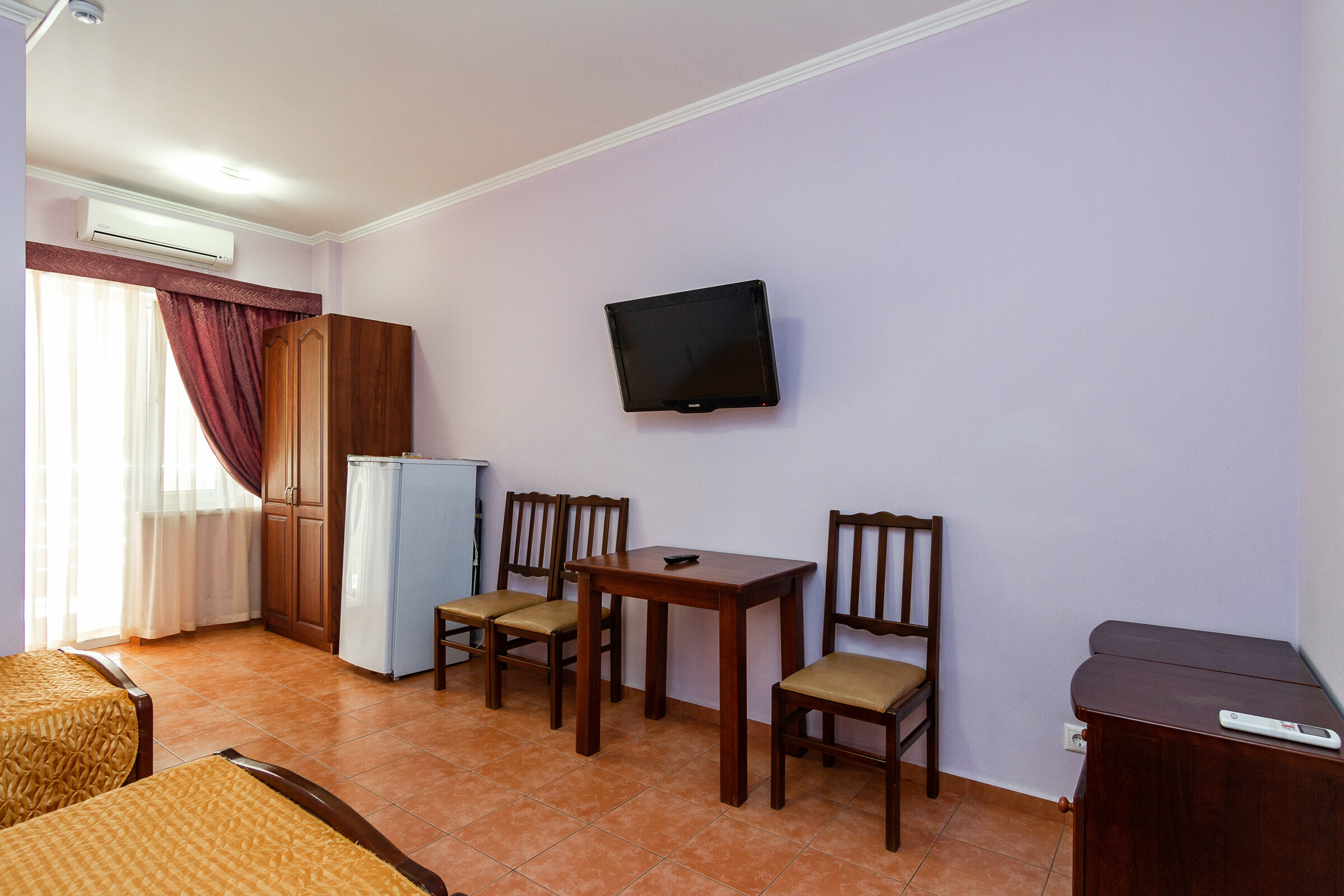 Трехместный номер с балконом