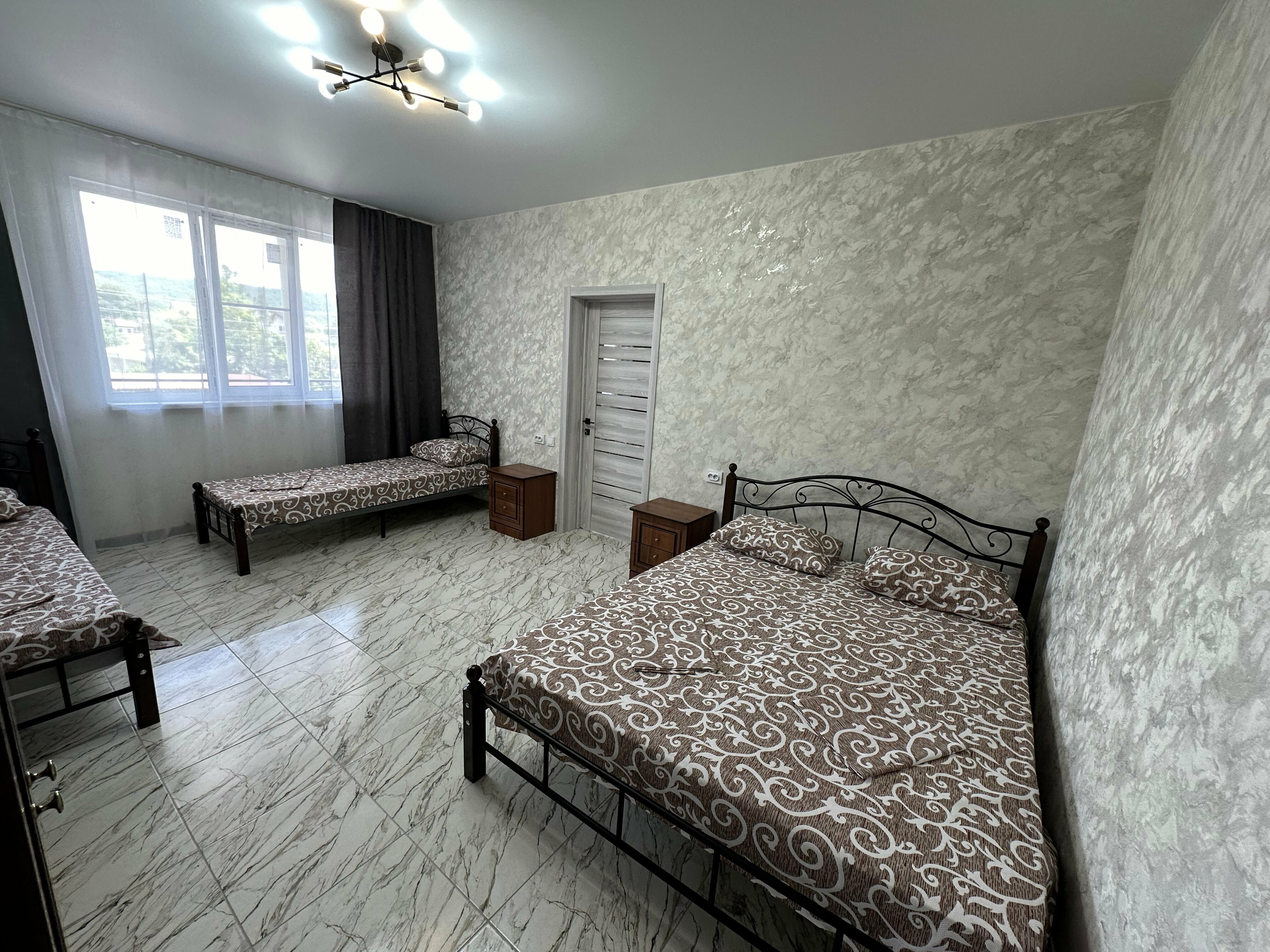 Улучшенный четырехместный номер