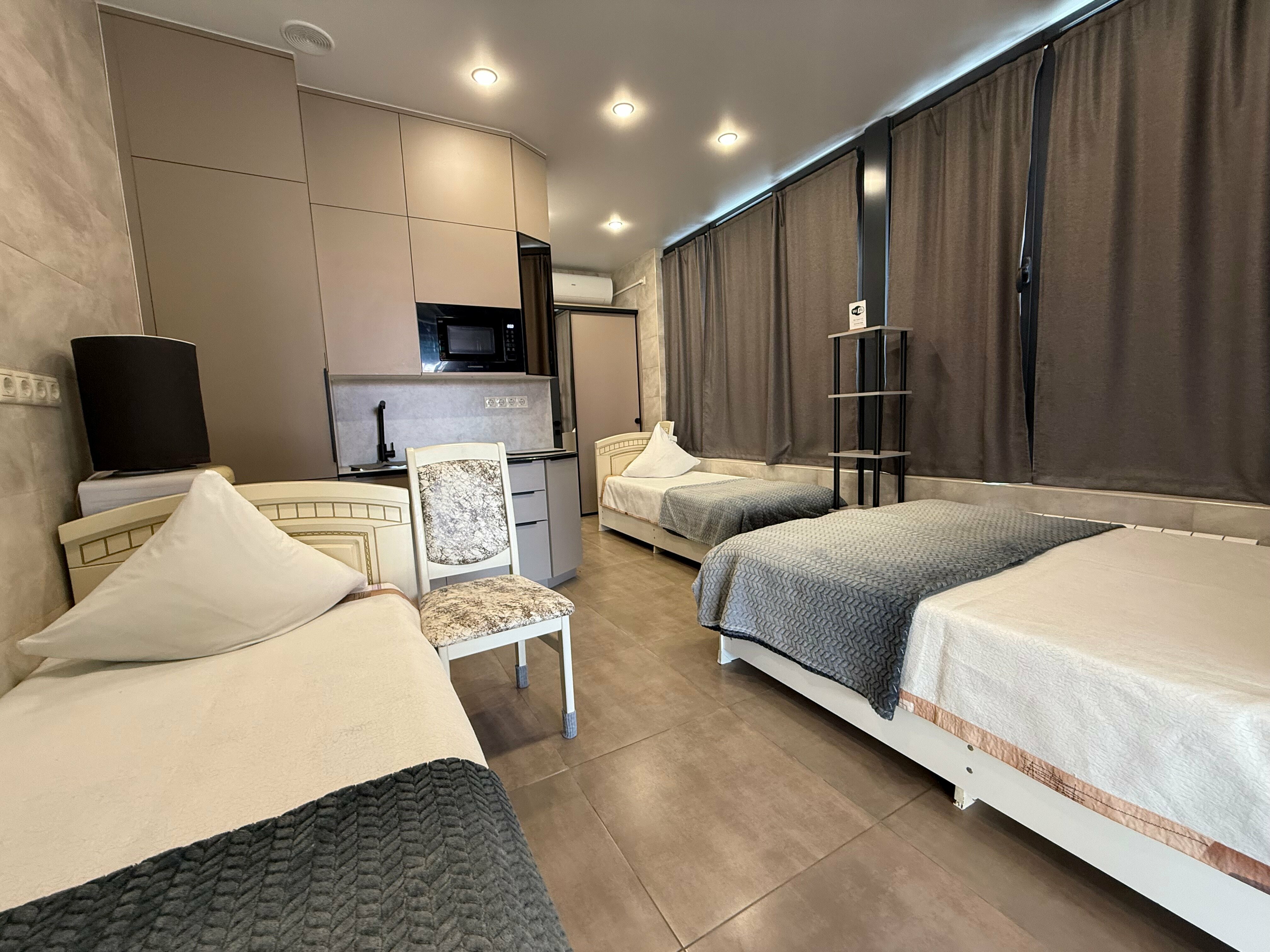 Семейный четырехместный номер с 3мя кроватями