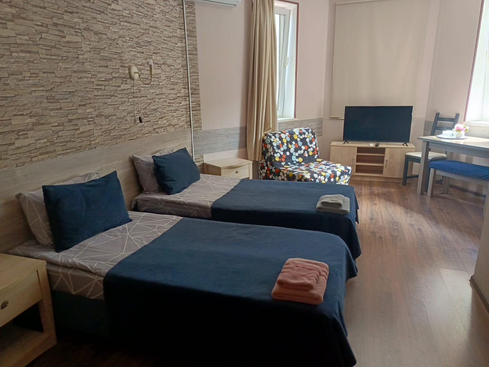 Трехместный номер Делюкс