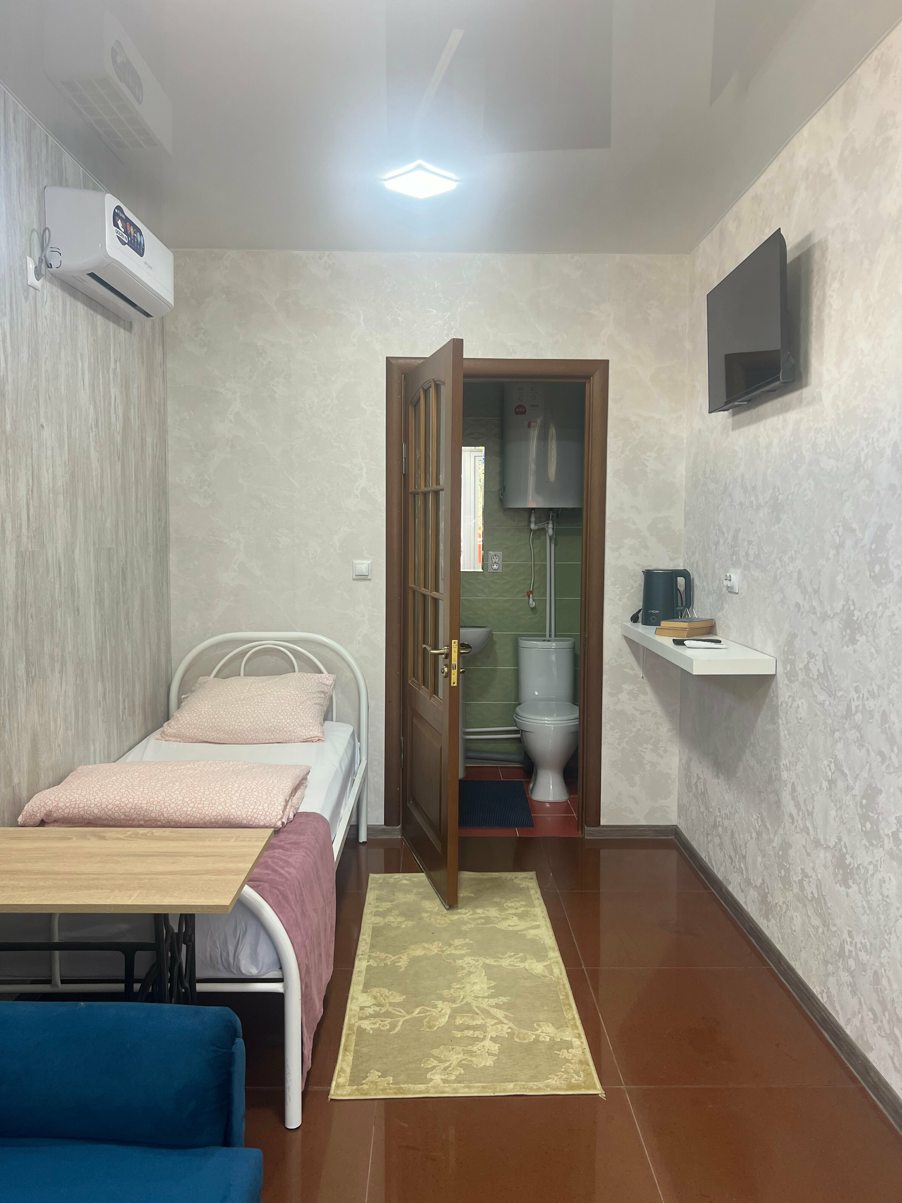 Двухместный номер эконом-класса с 2 отдельными кроватями