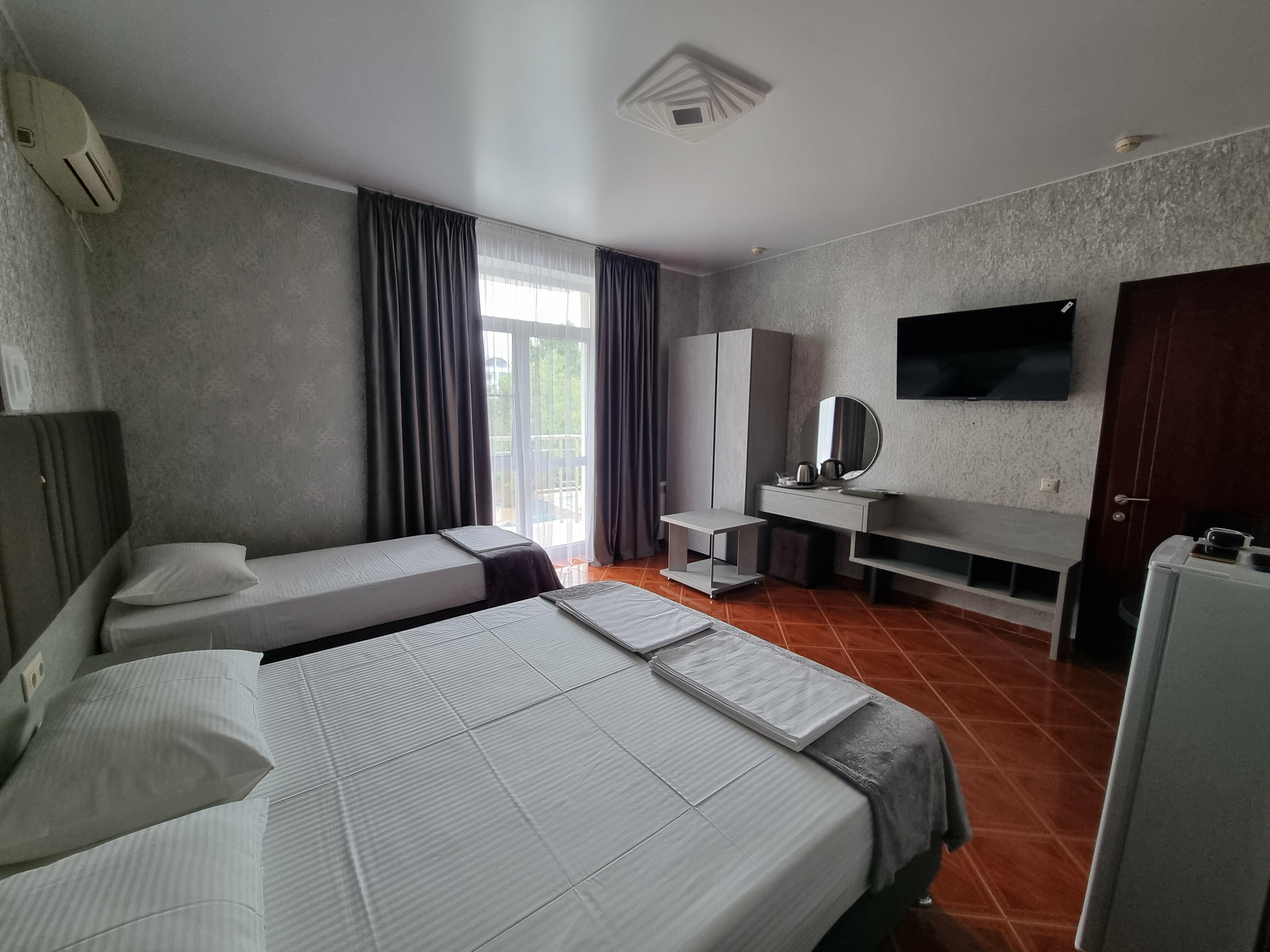 Улучшенный трехместный номер