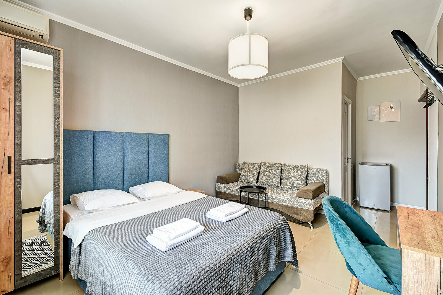 Трехместный номер с балконом