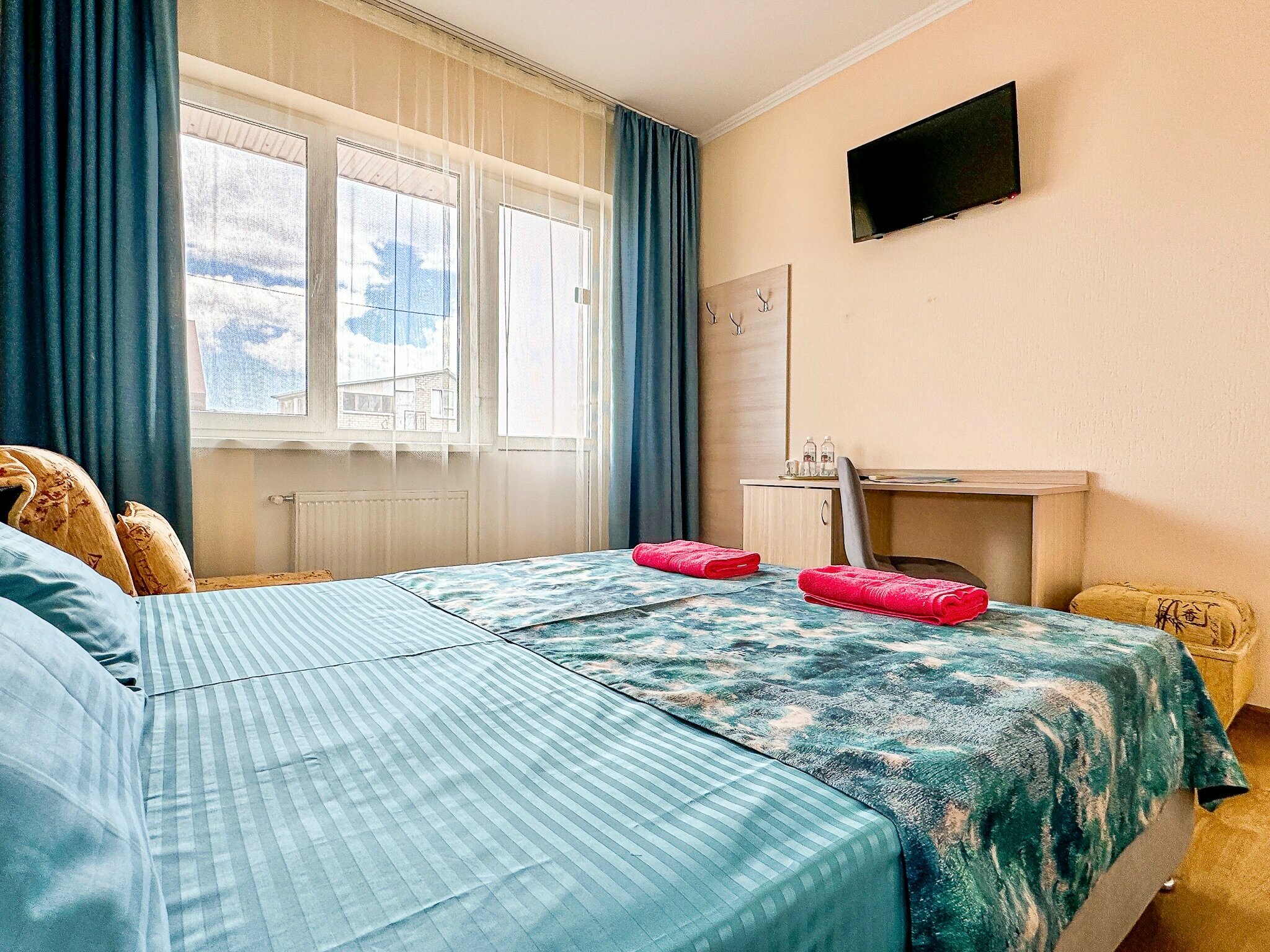 Двухместный номер с двухспальной кроватью с одним доп. местом