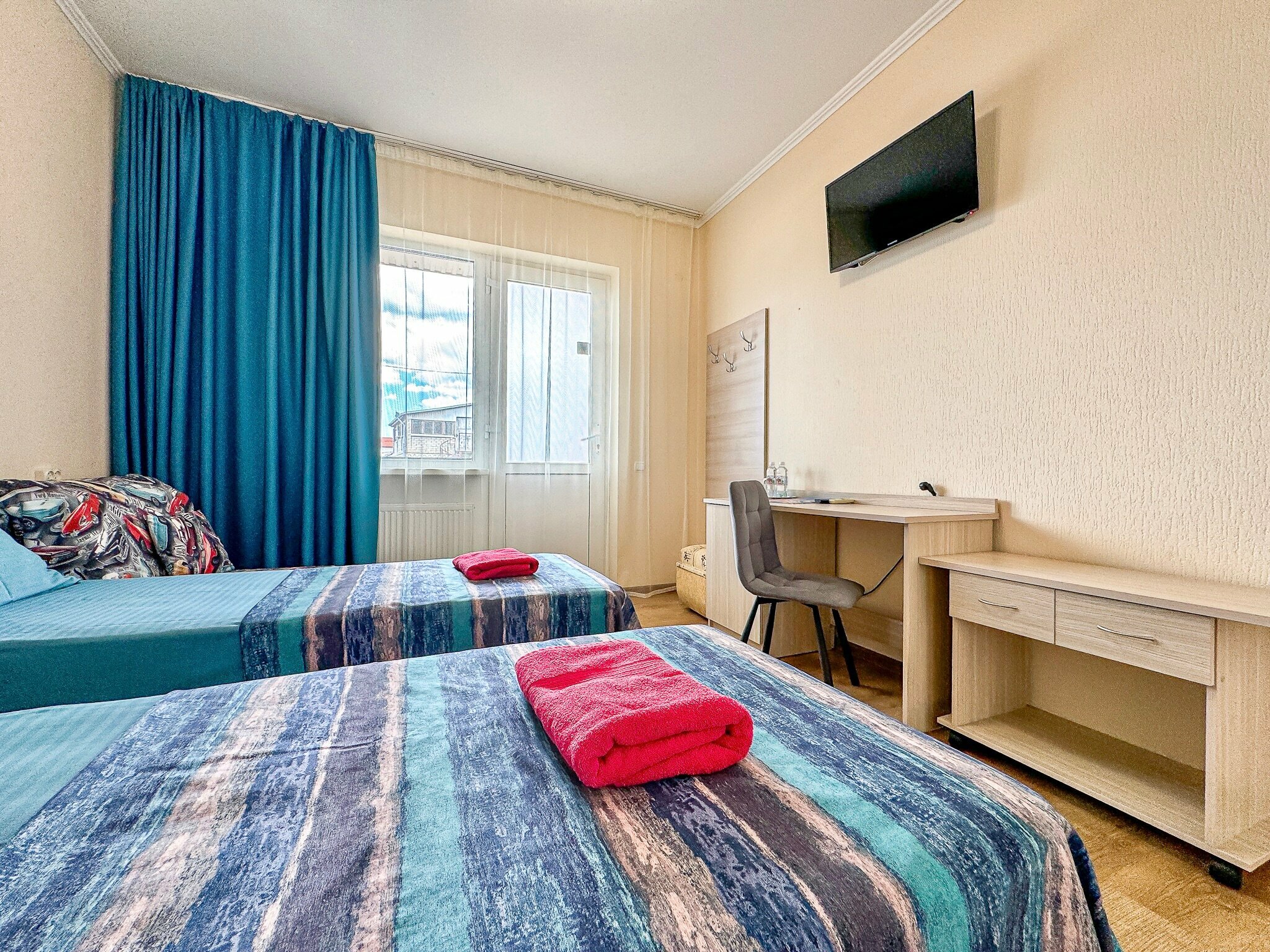 Двухместный номер с двумя раздельными кроватями с одним доп. местом