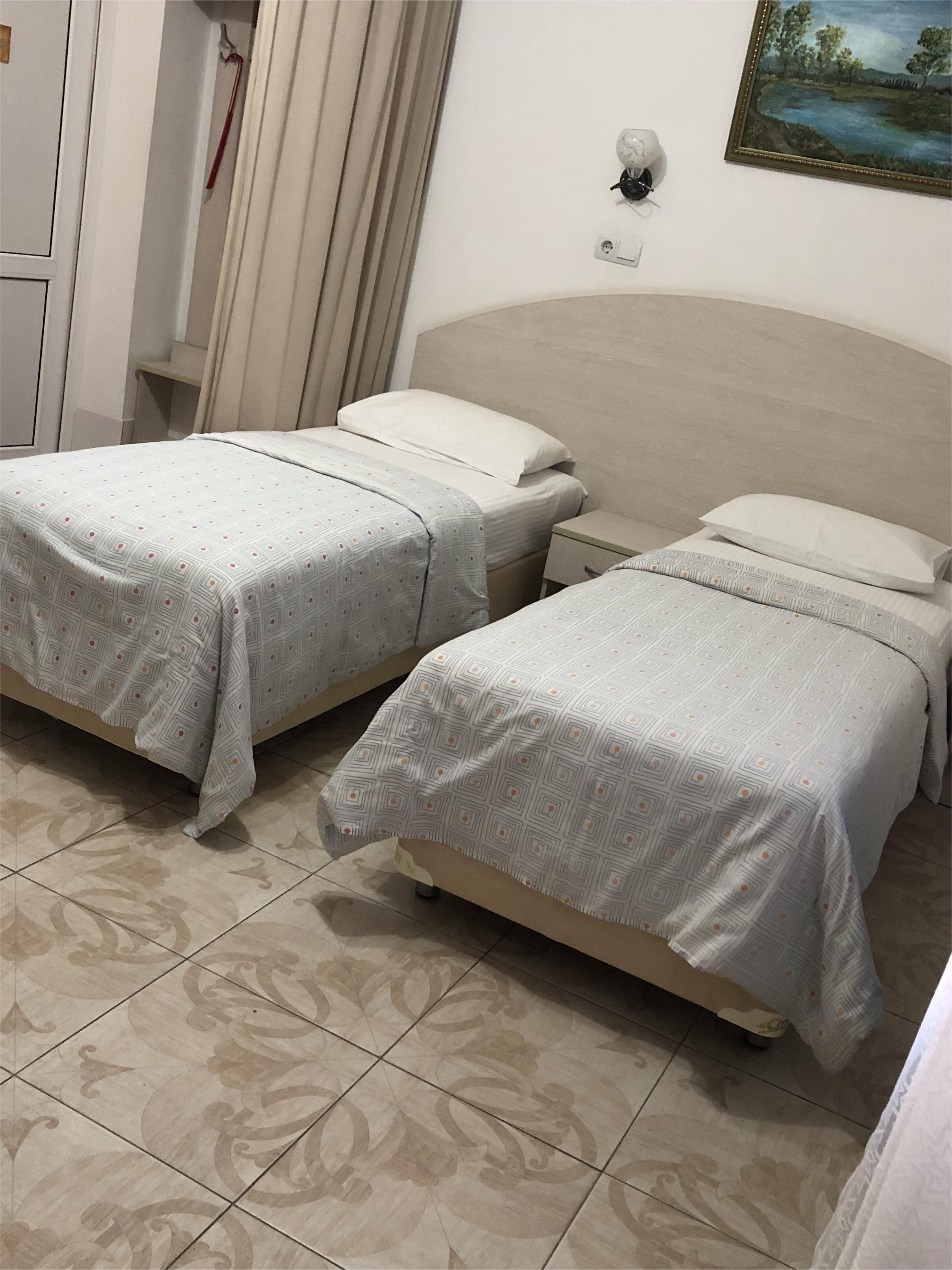 Небольшой двухместный номер с 1 кроватью или 2 отдельными кроватями