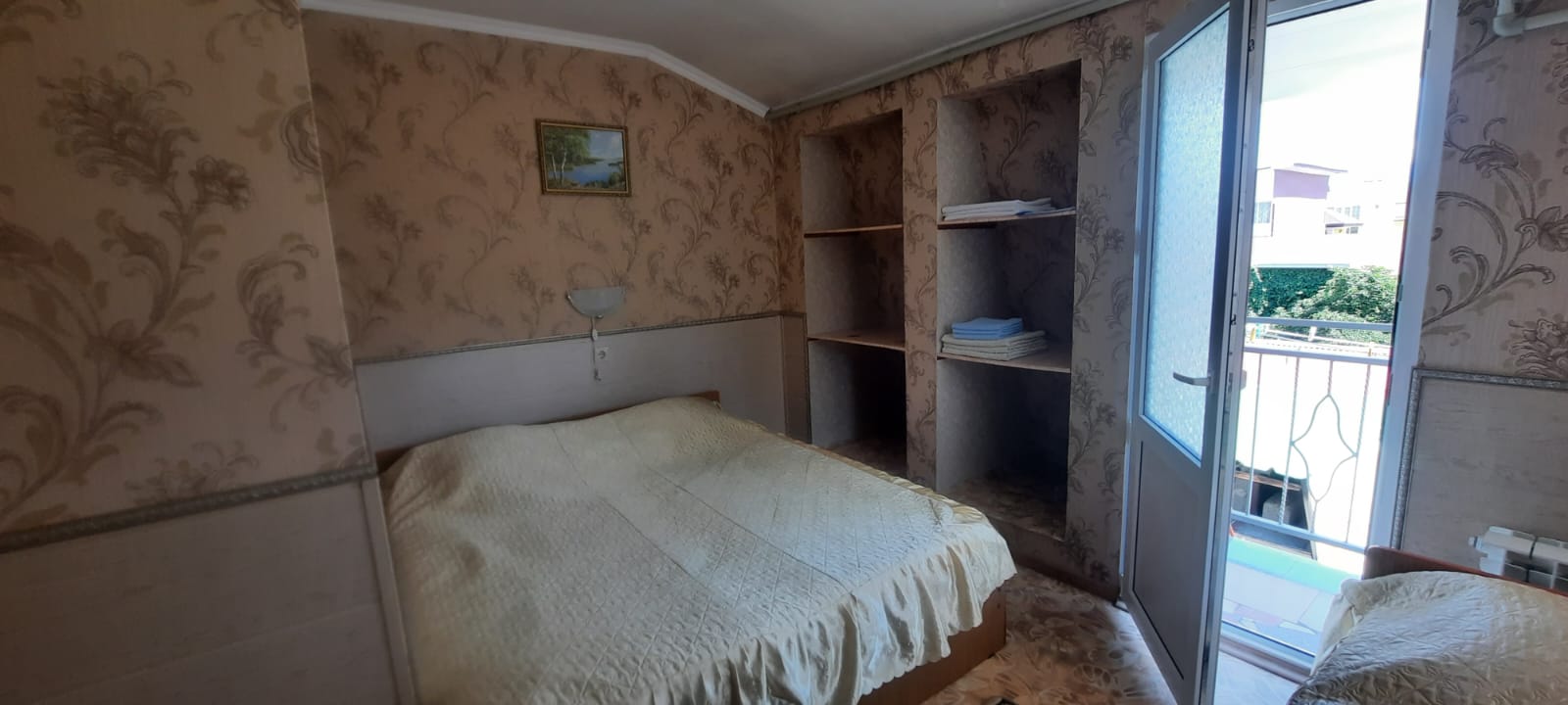 Трехместный номер с балконом