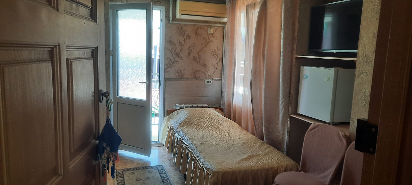 Трехместный номер с балконом