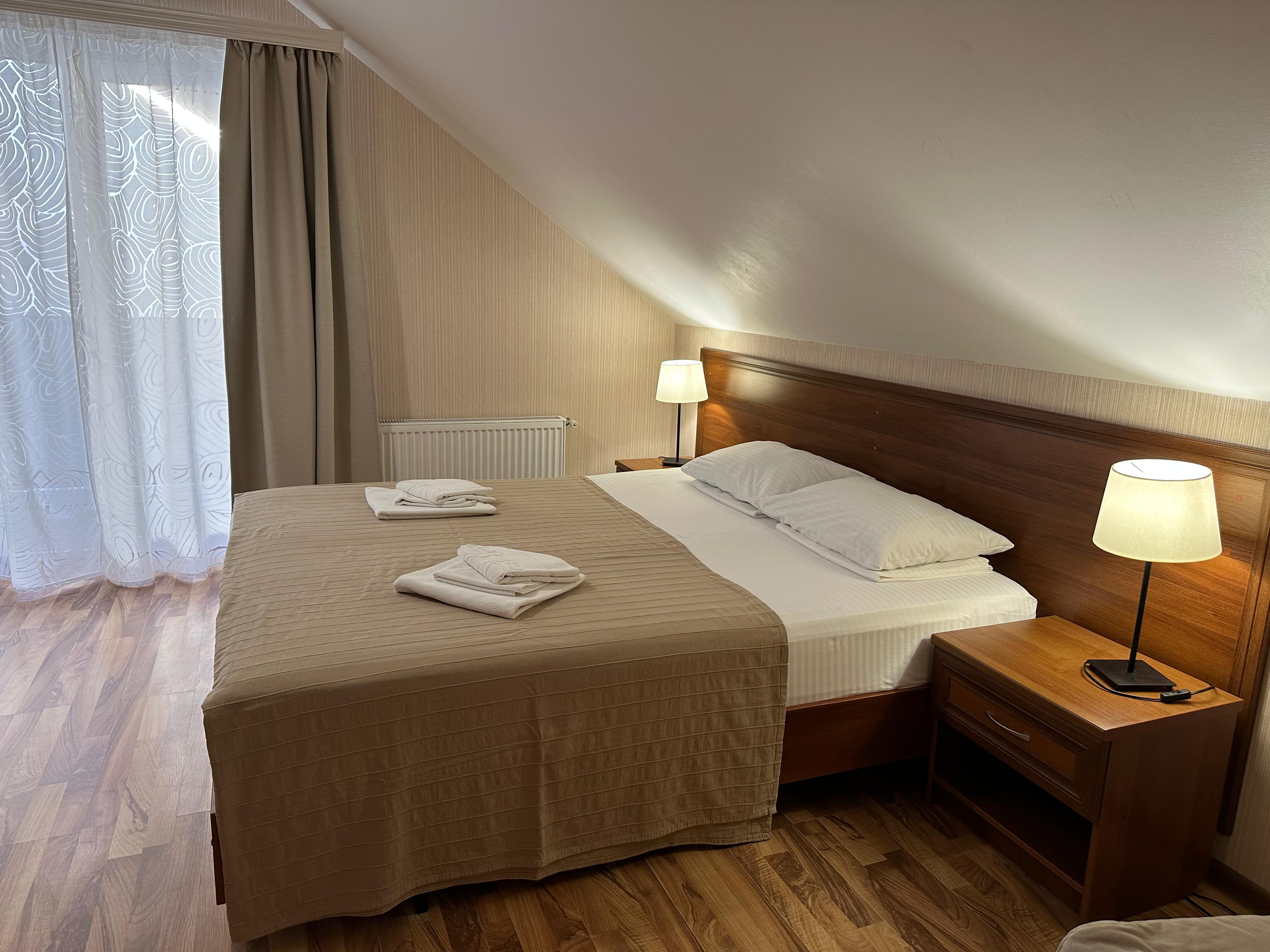 Улучшенный двухместный номер с 1 кроватью или 2 отдельными кроватями