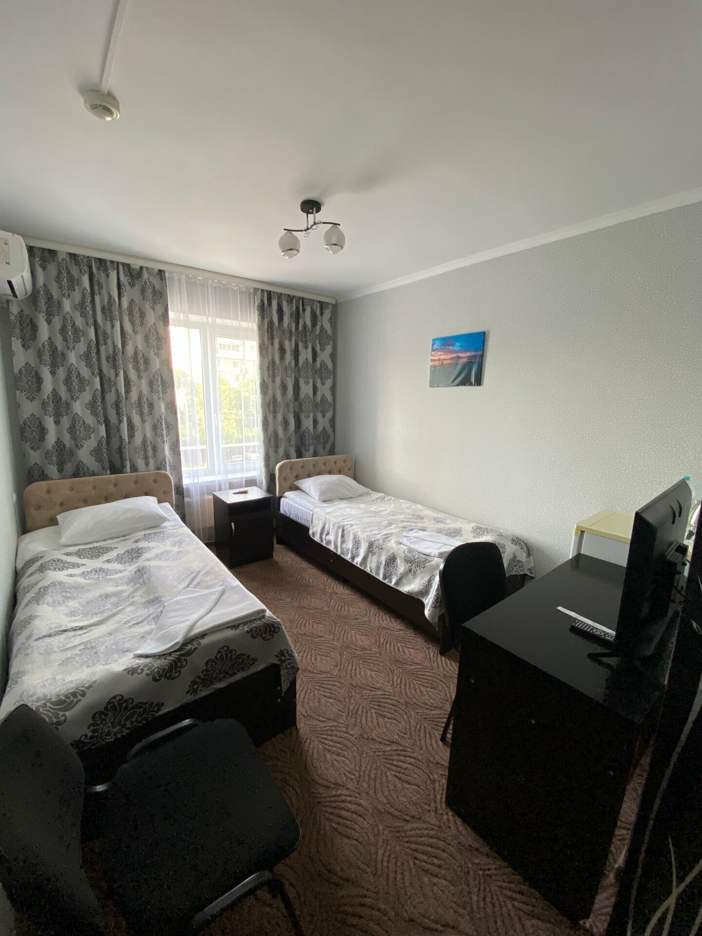 Улучшенный двухместный номер с 2 отдельными кроватями