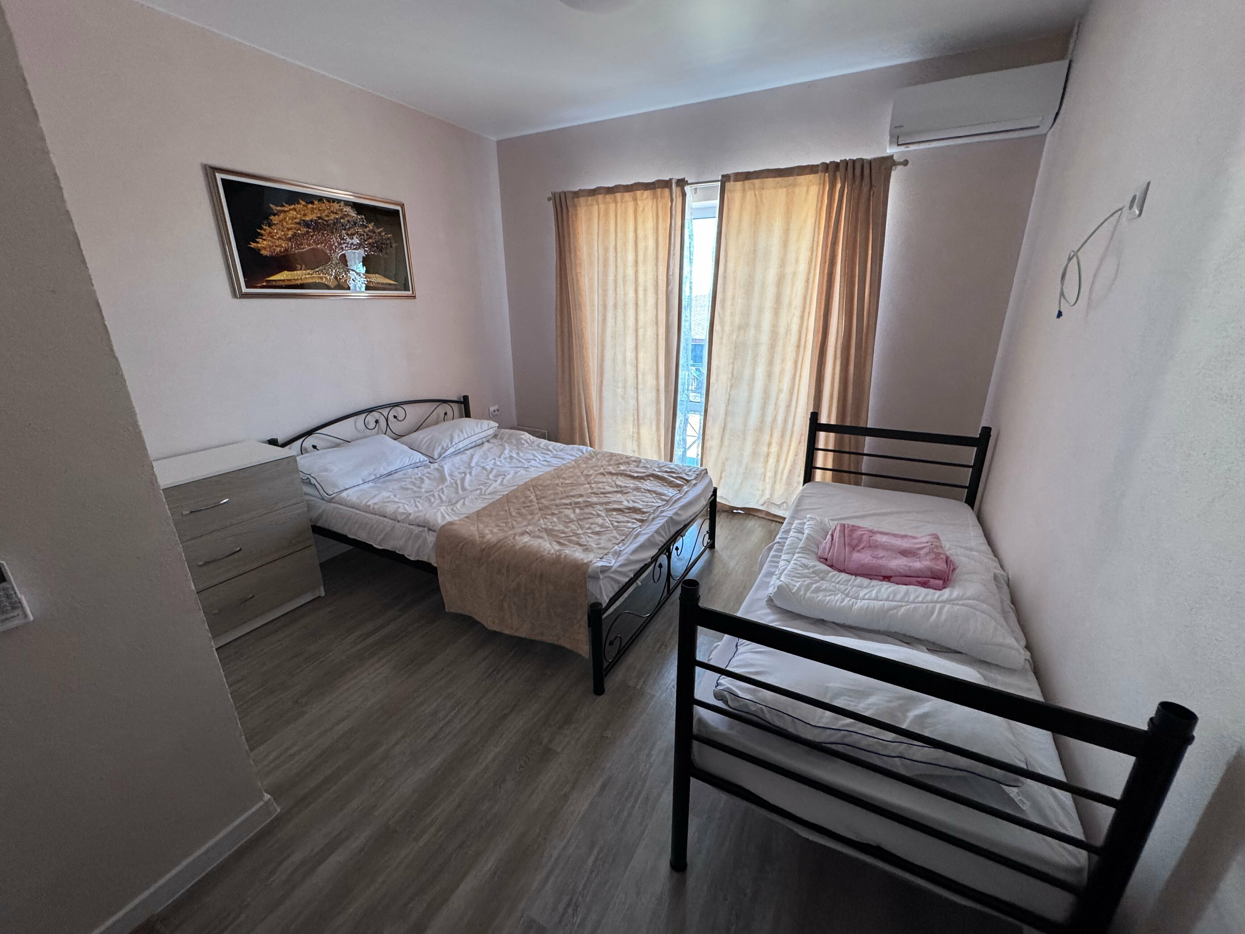 Трехместный номер с балконом