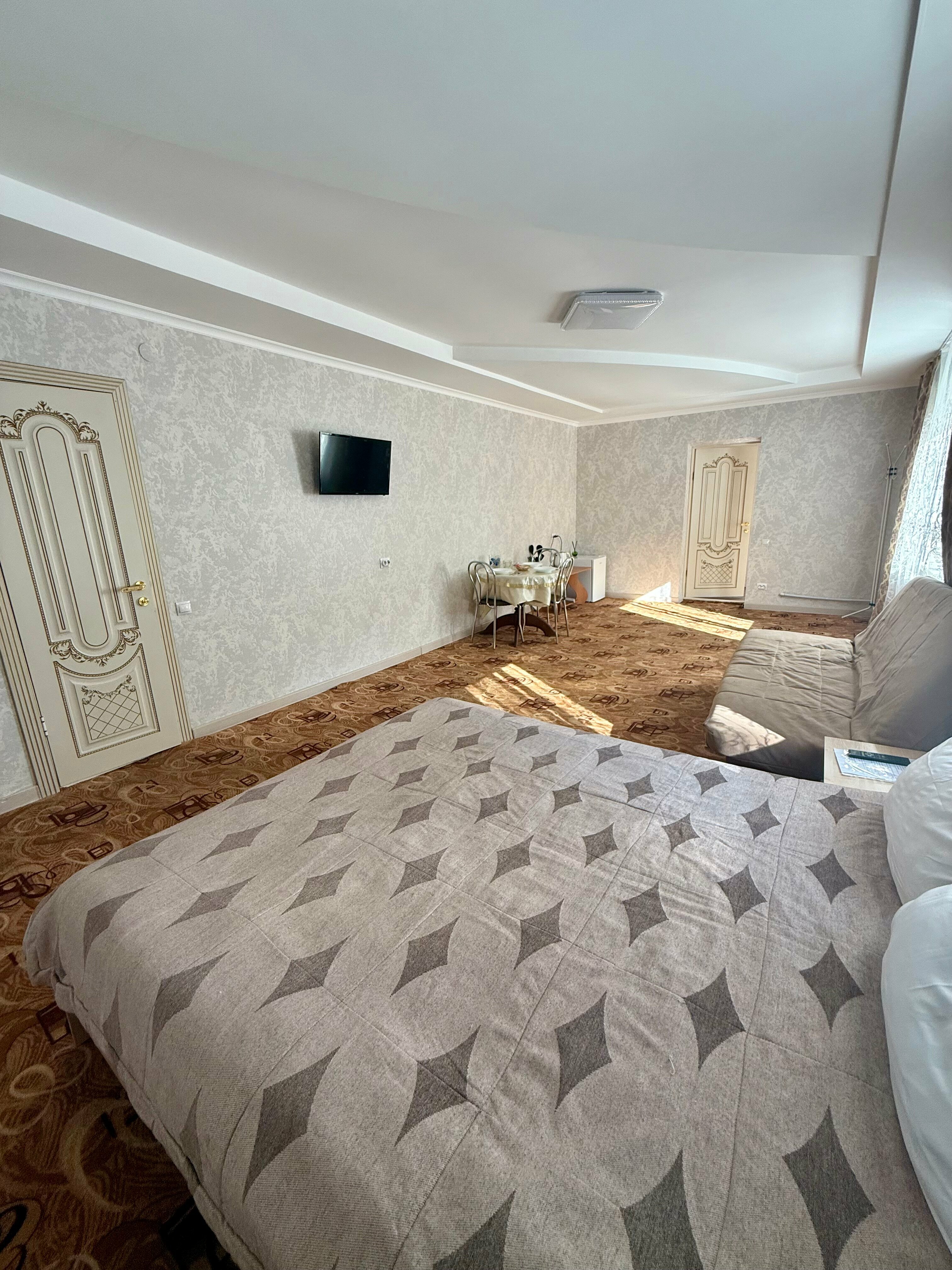 Улучшенный четырехместный номер