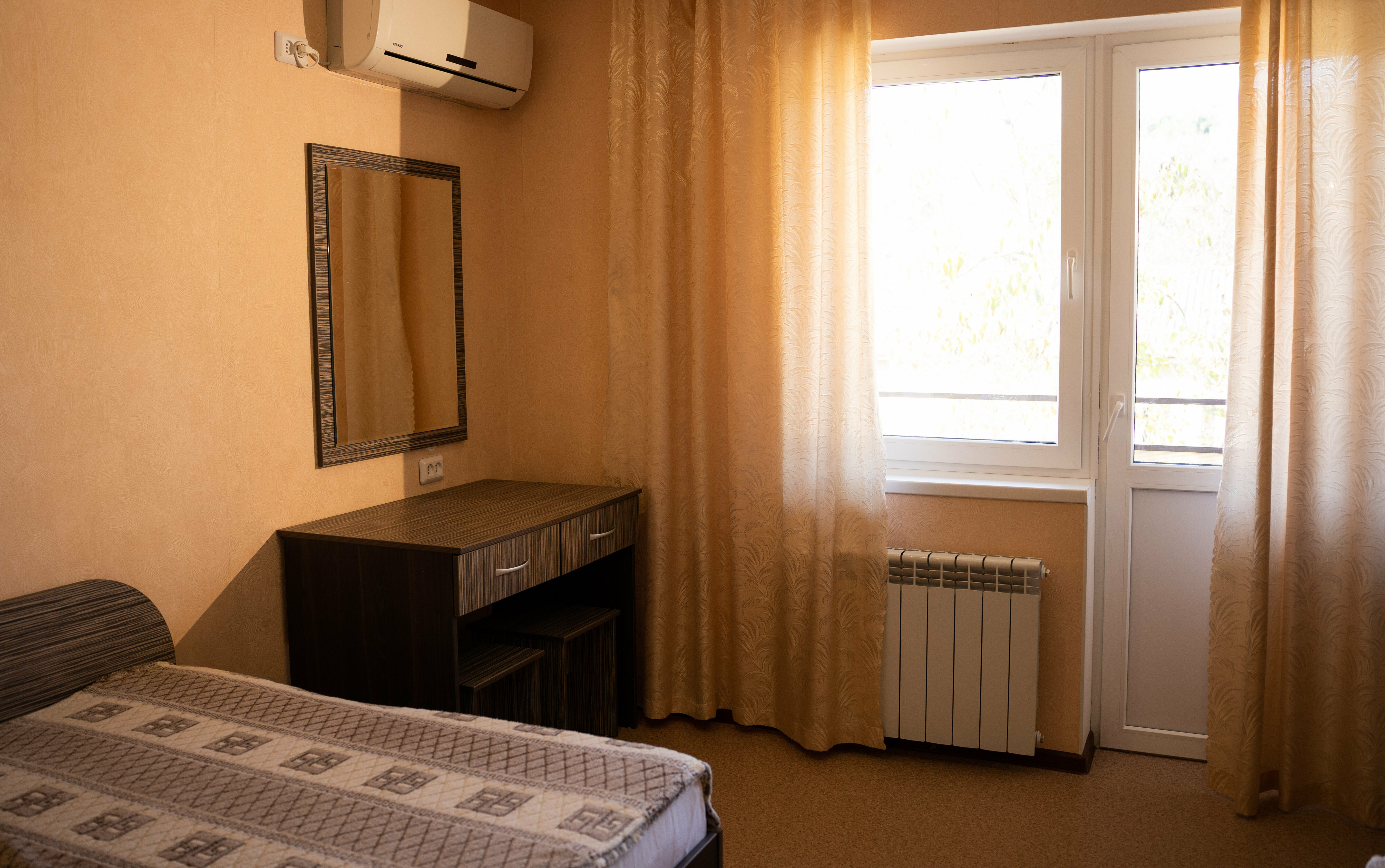 Трехместный номер с балконом