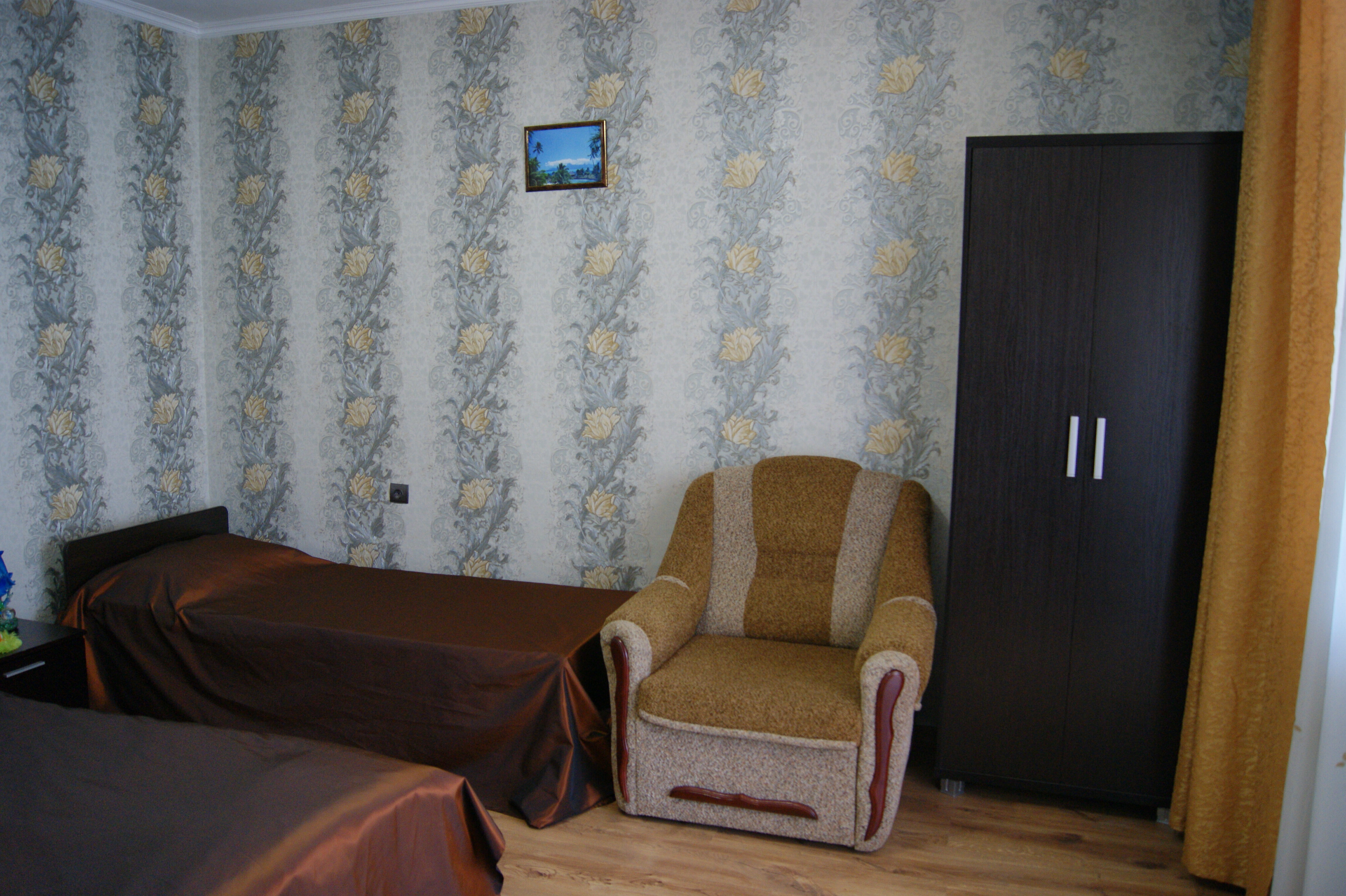 Четырехместный номер с видом на сад