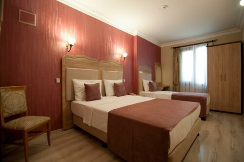 Economy Triple Room в Artefes Hotel