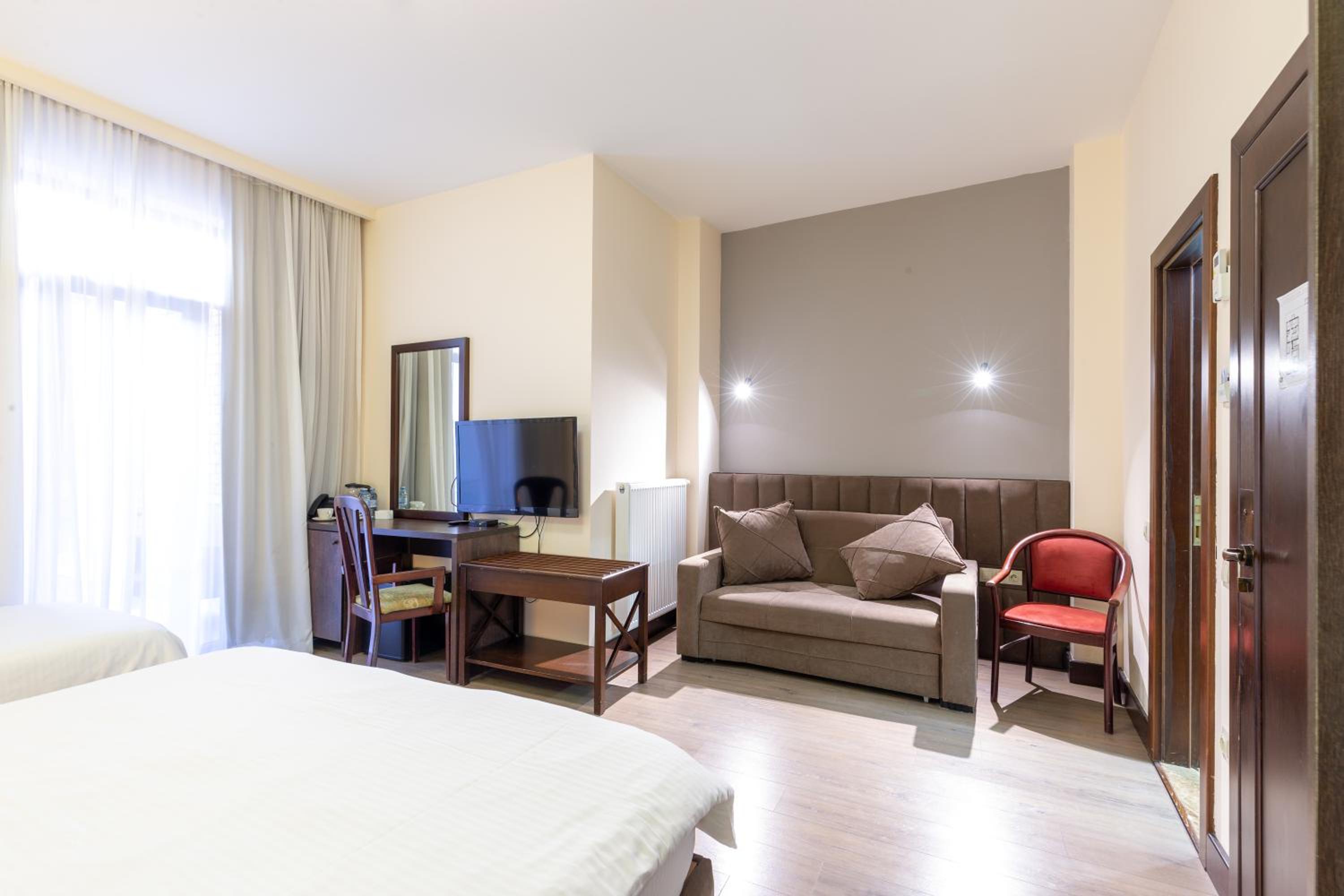 Quadruple Room with Balcony