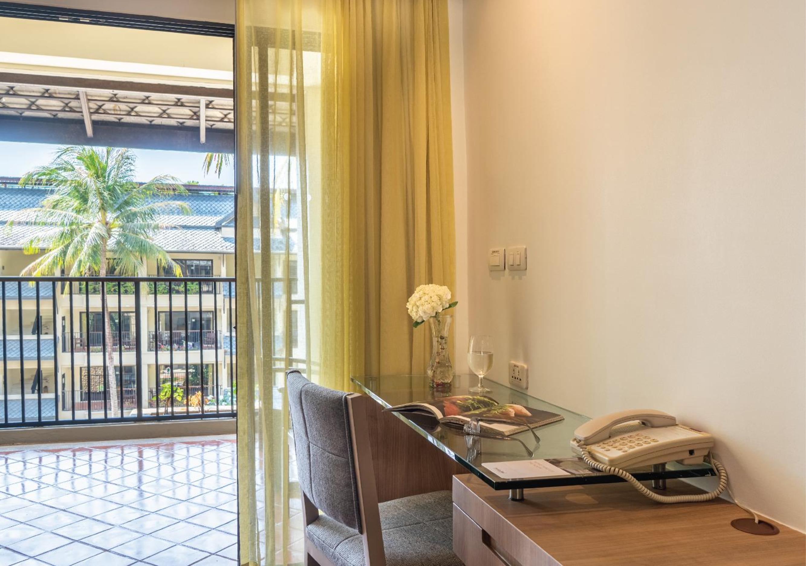 One-Bedroom Suite with Terrace and Pool View