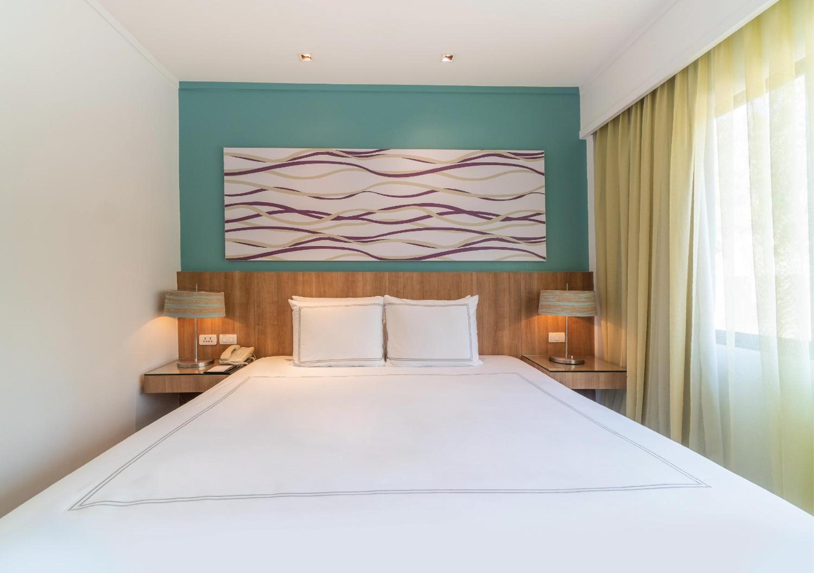 One-Bedroom Suite with Terrace and Pool View