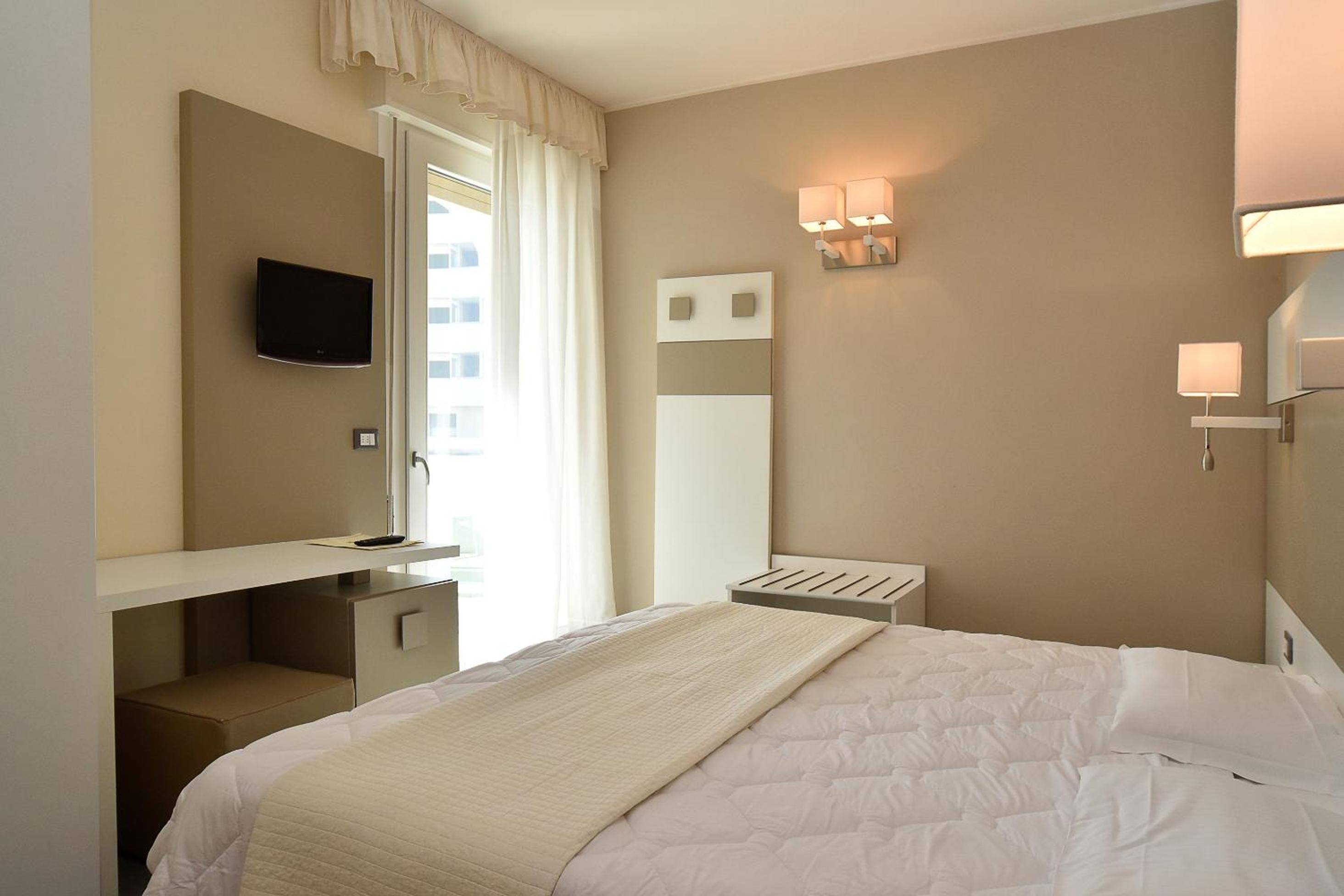 Comfort Quadruple Room with Balcony and Lateral Sea View