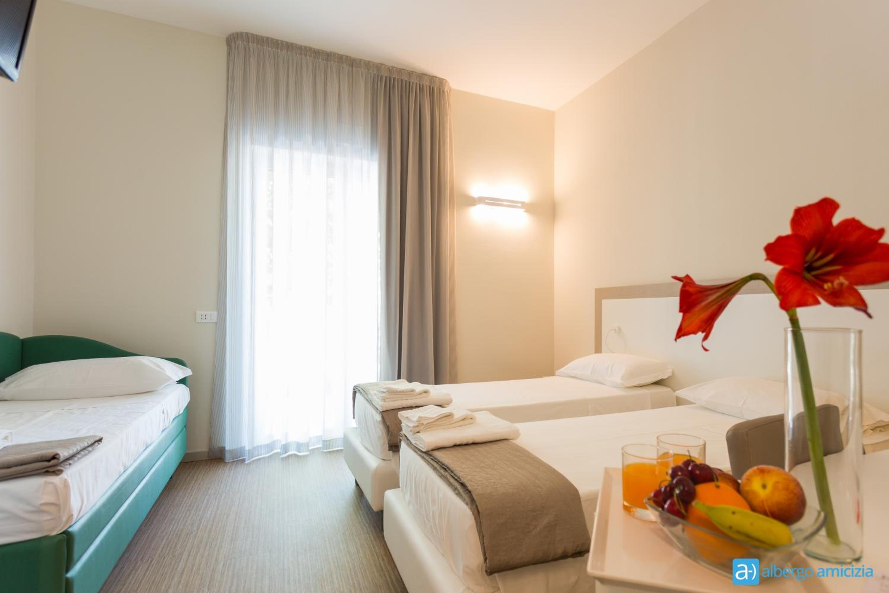 Family Room with Balcony (2 Adults + 2 Children)