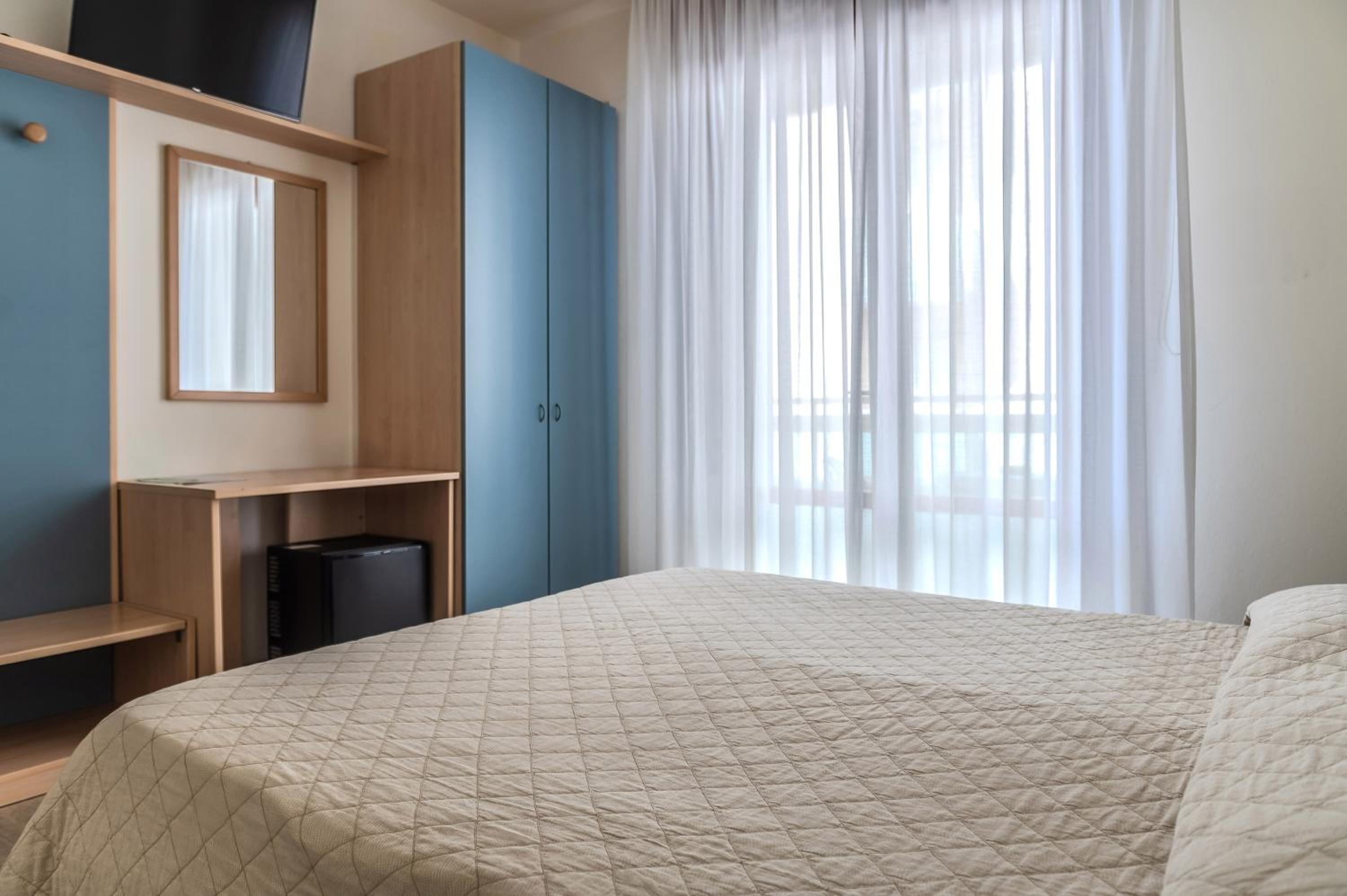 Standard Quadruple Room with Side Sea View