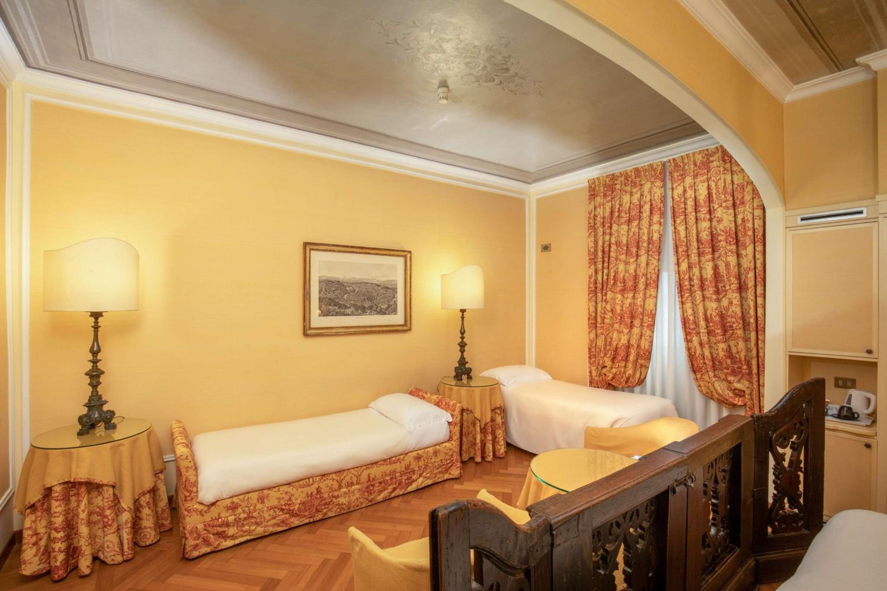 Standard Family Room with One Queen Bed and Two Single Beds - Non-Smoking