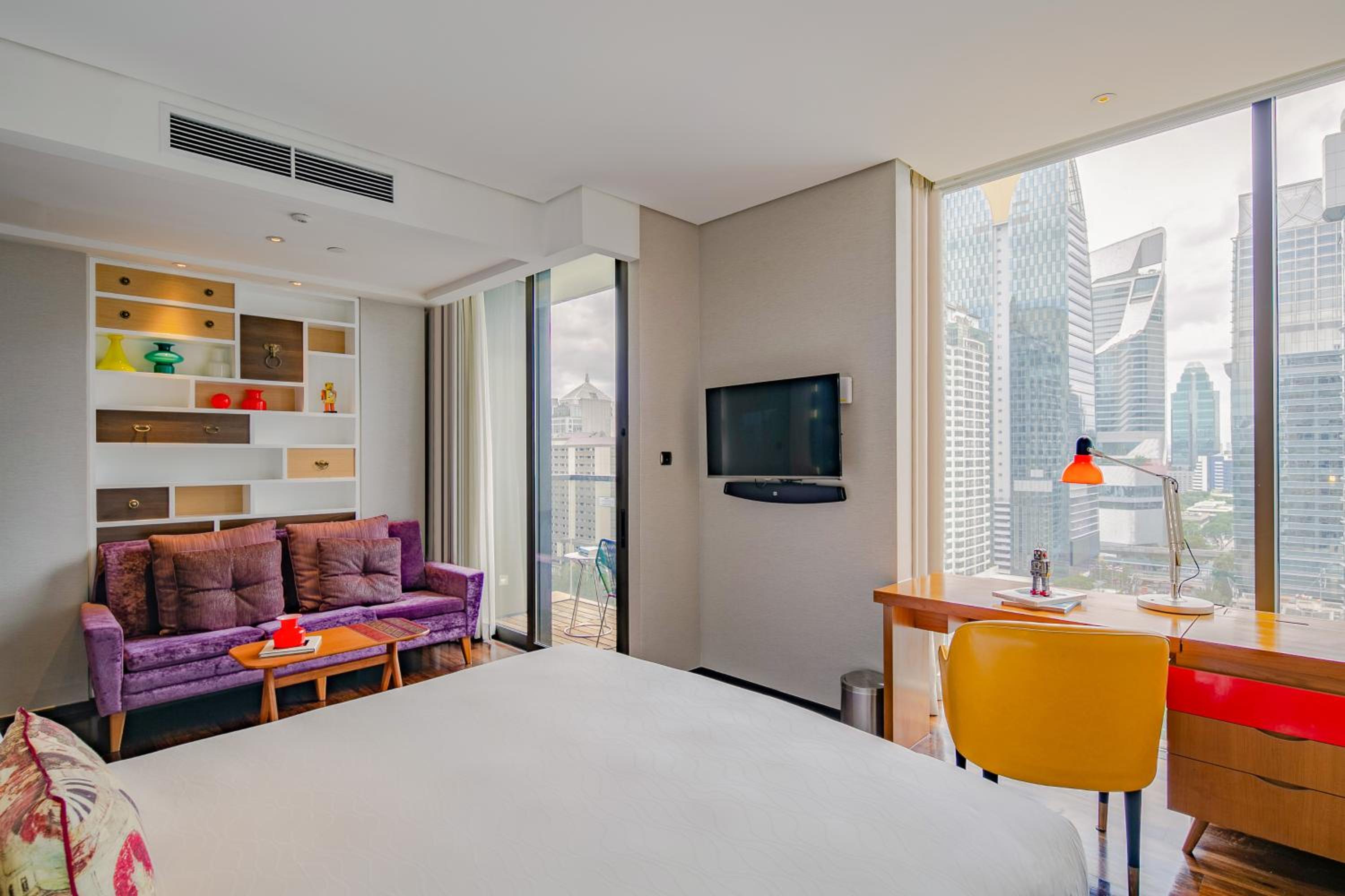 Standard Corner King Room with Balcony and Garden View