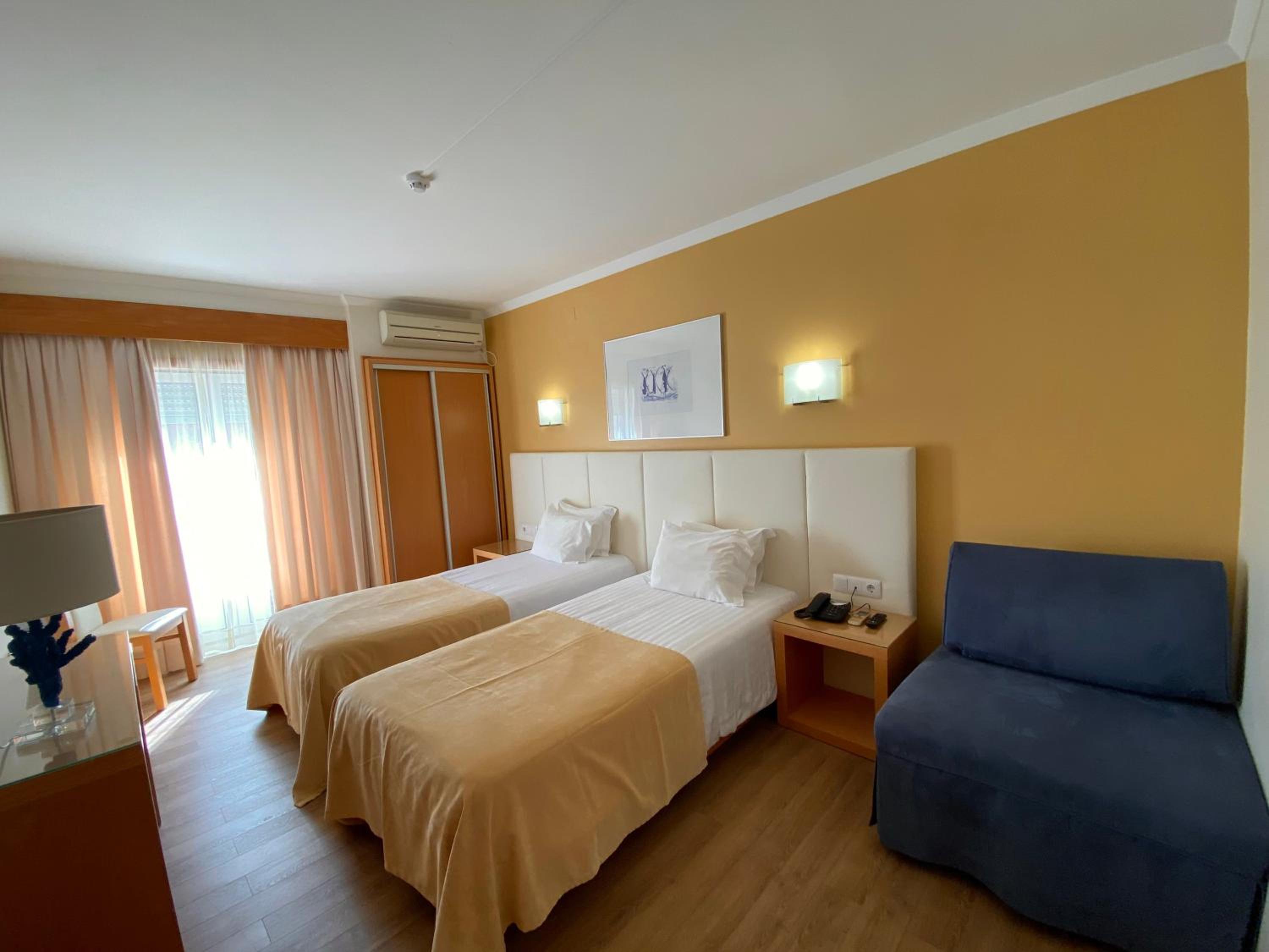 Double Room with Extra Bed (2 Adults + 1 Child)