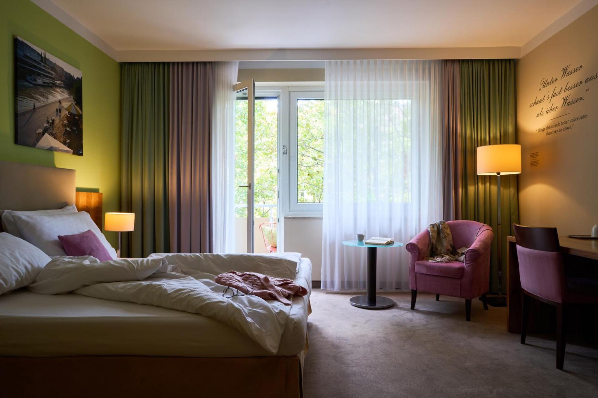 Deluxe Double Room with Balcony and Courtyard View