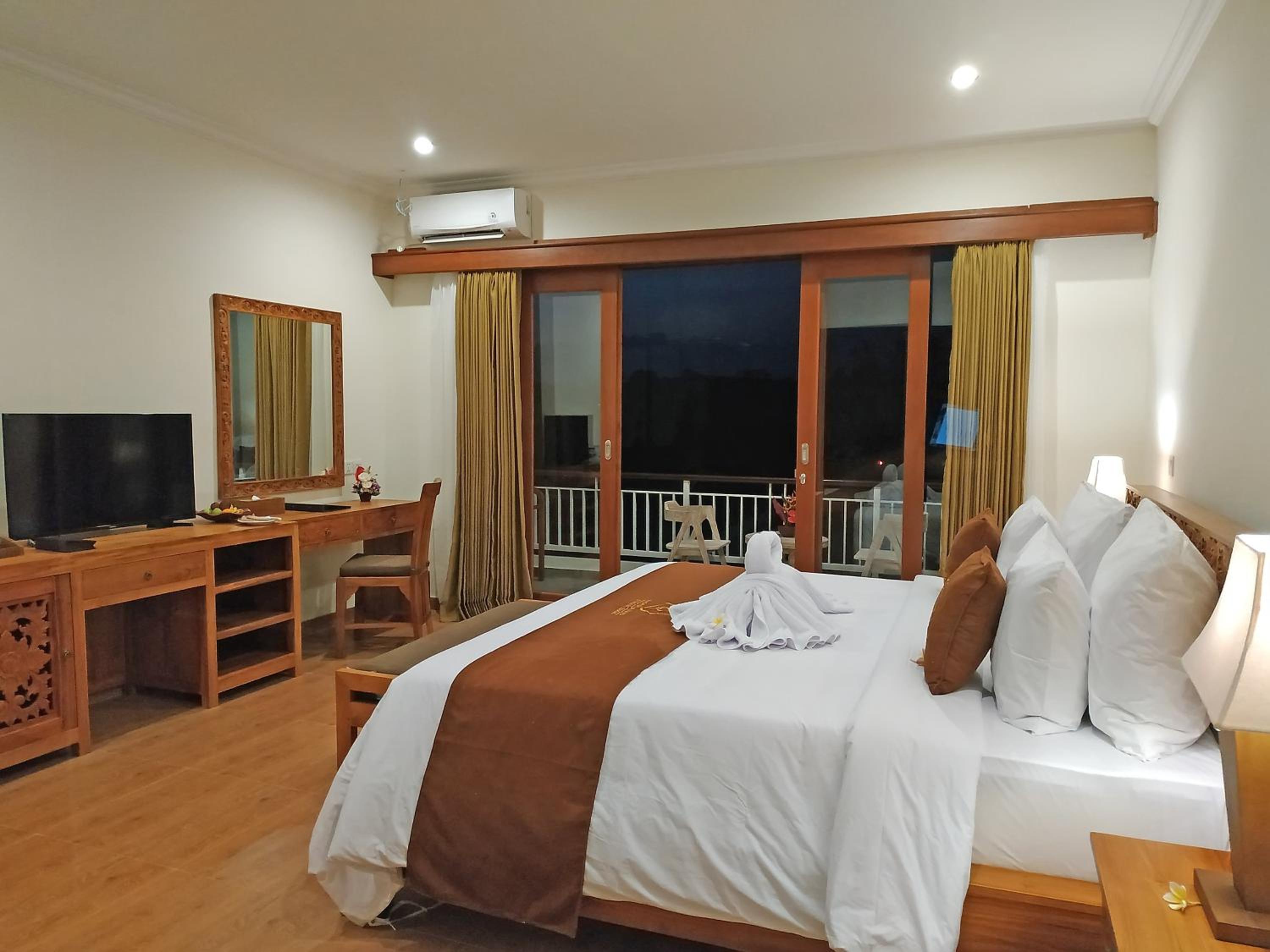 Deluxe Room Balcony with Rice Field View