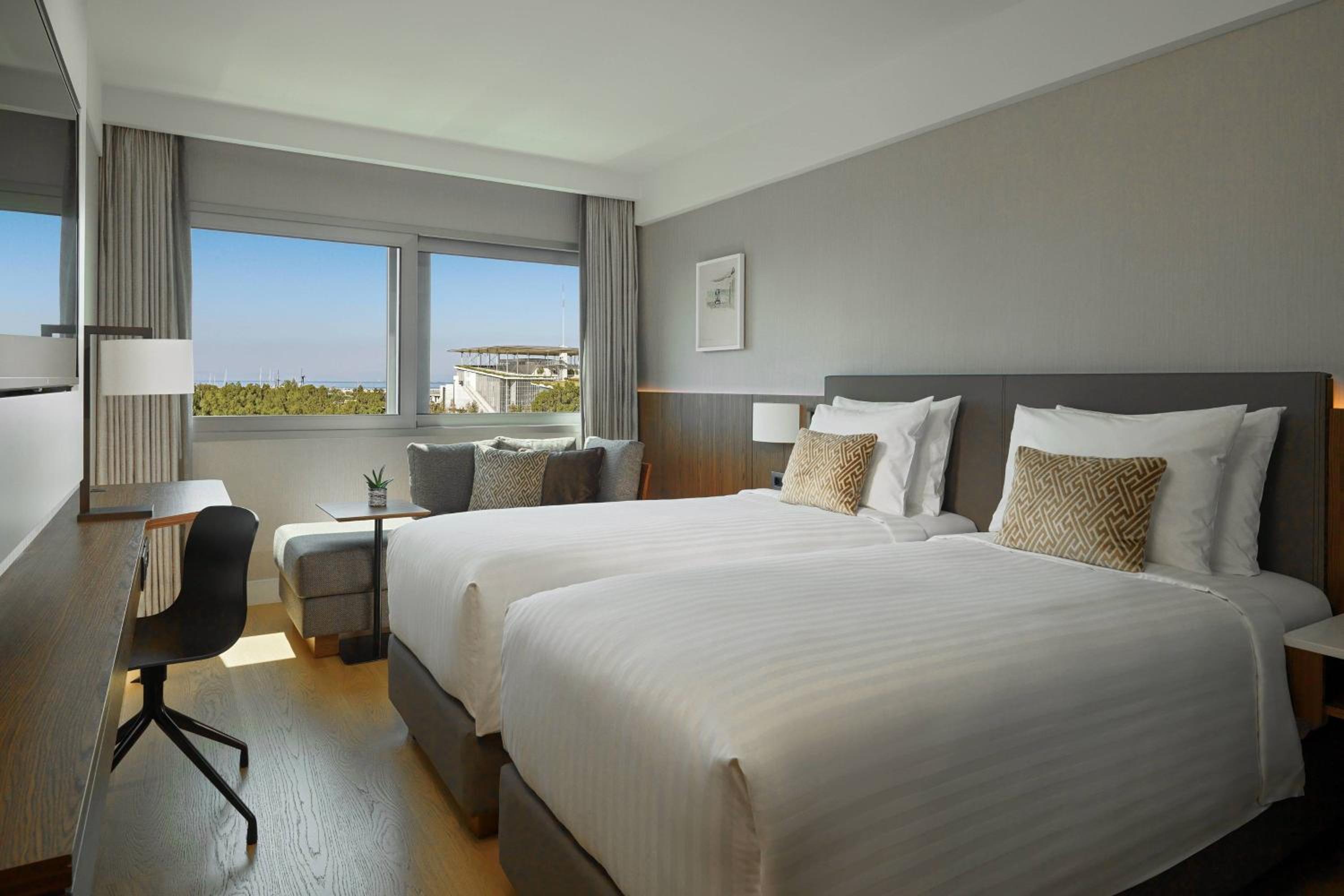 Guest Room with Two Twin Beds and View