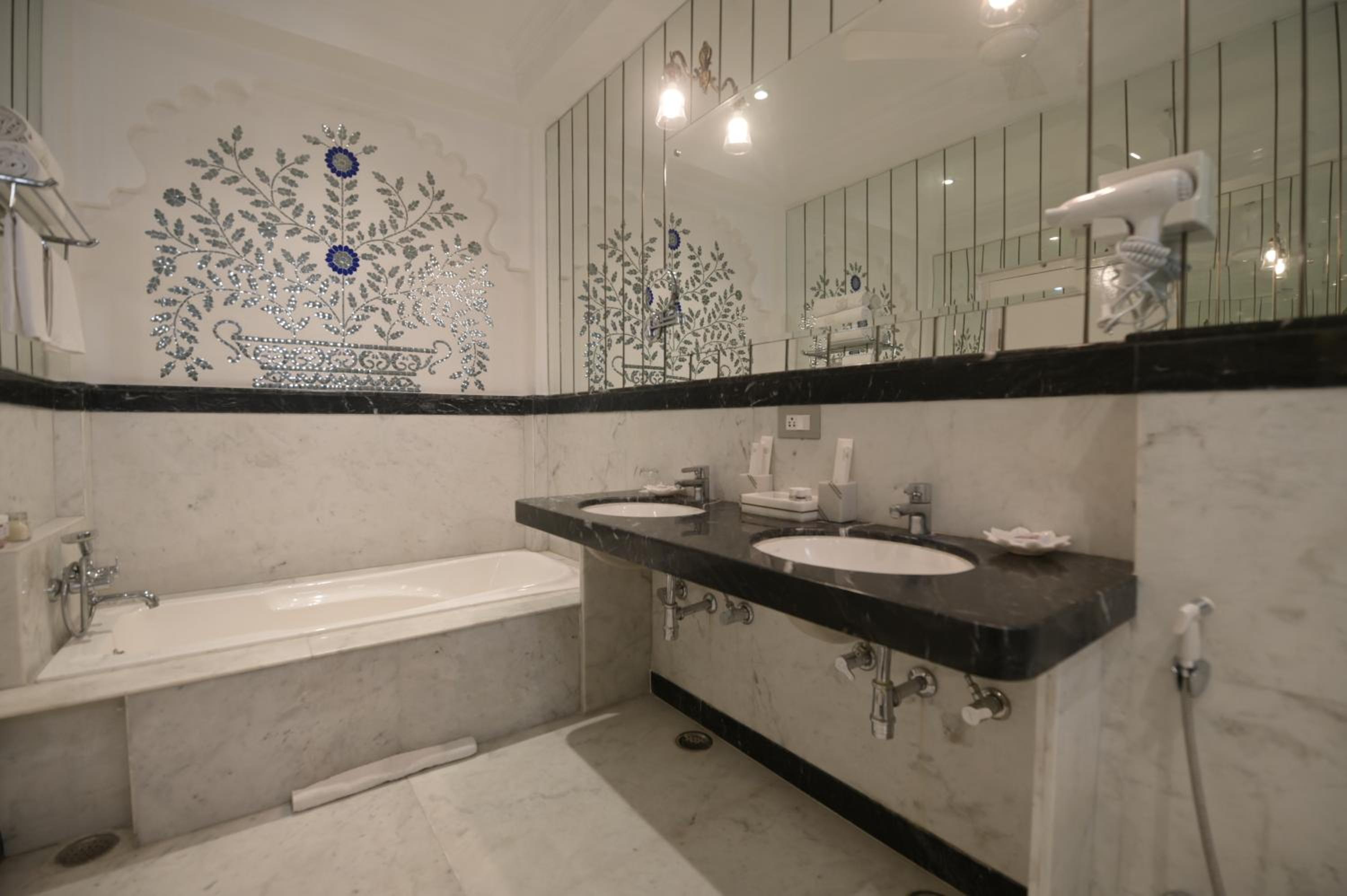 Suite with Lake View :  Avail 15% Discount on all restaurant bills,50% Discount on any spa services (Valid for stay till 30th September 2025)