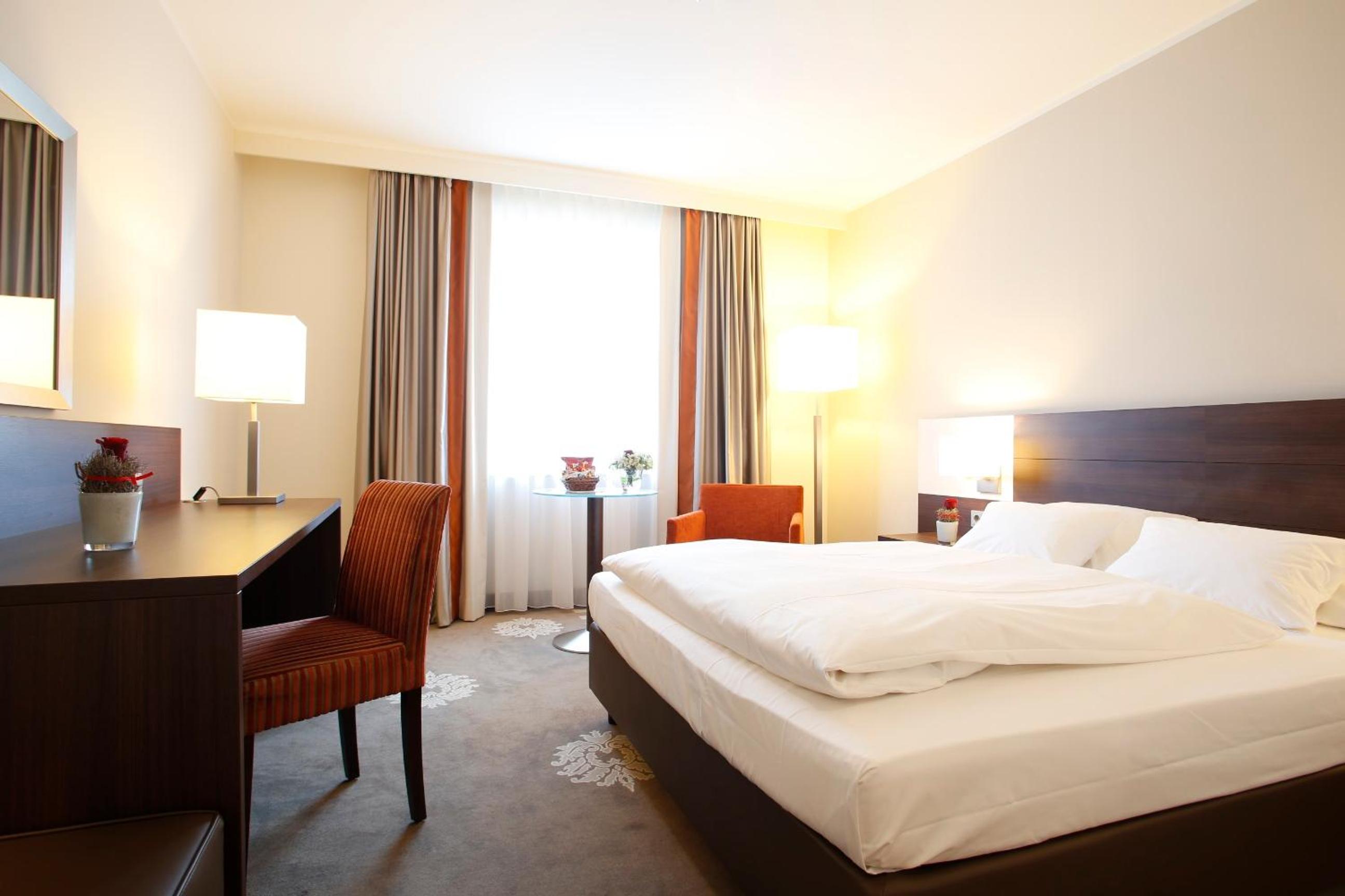 Einzelzimmer mit französischem Bett