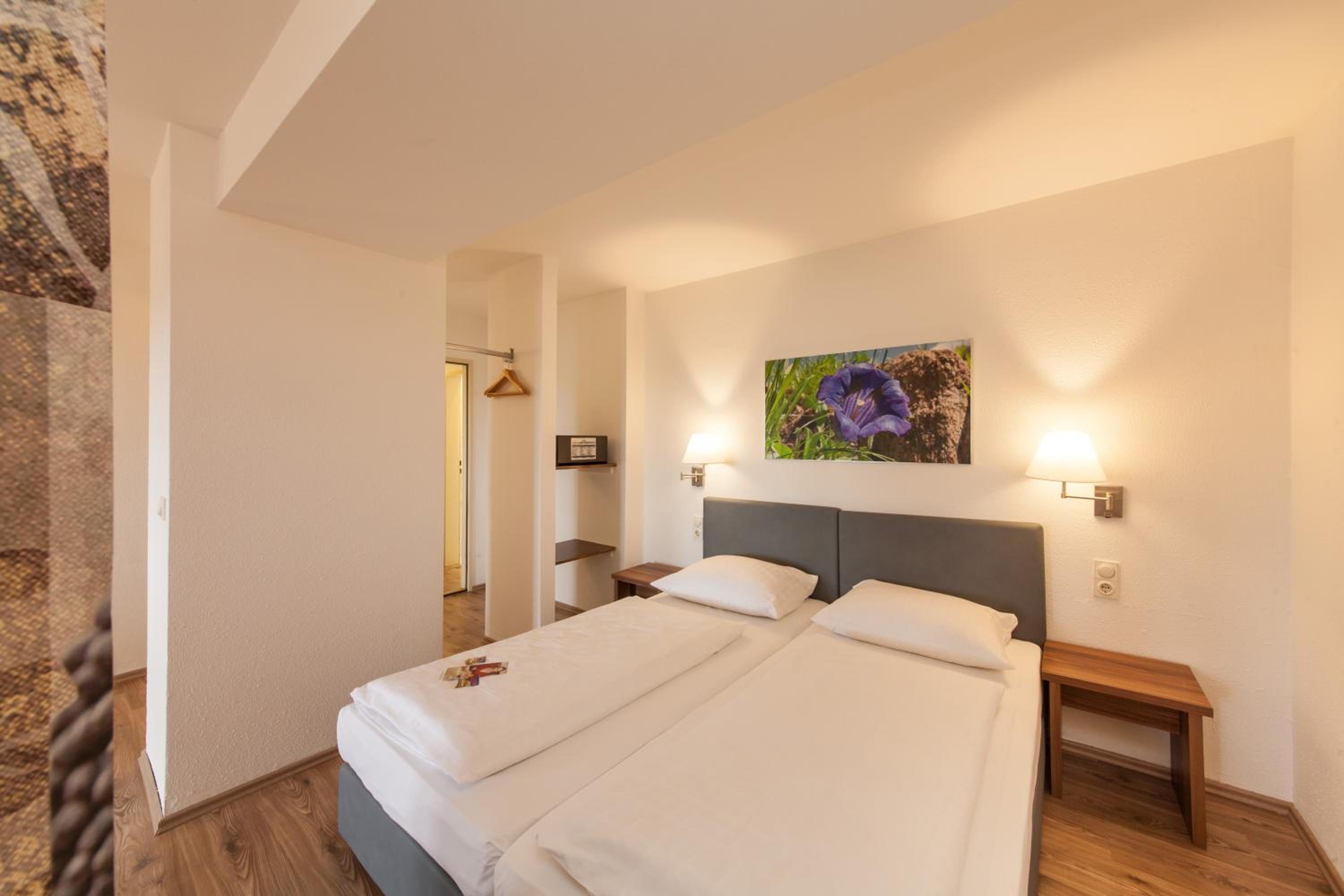 Family Room with One Double Bed and Two Single Beds