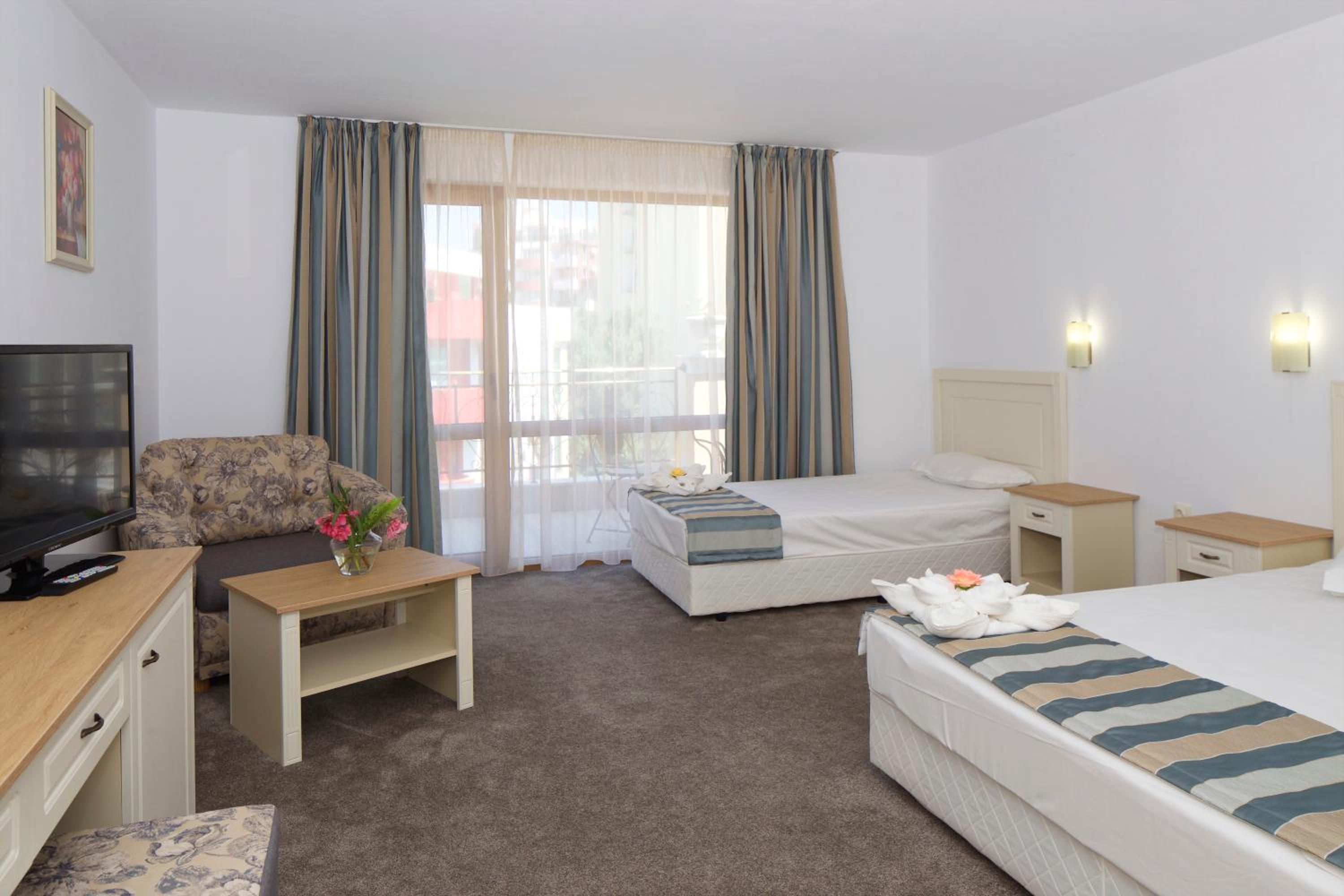 Deluxe Family Room with Balcony ( 3 Adults +1 Child)