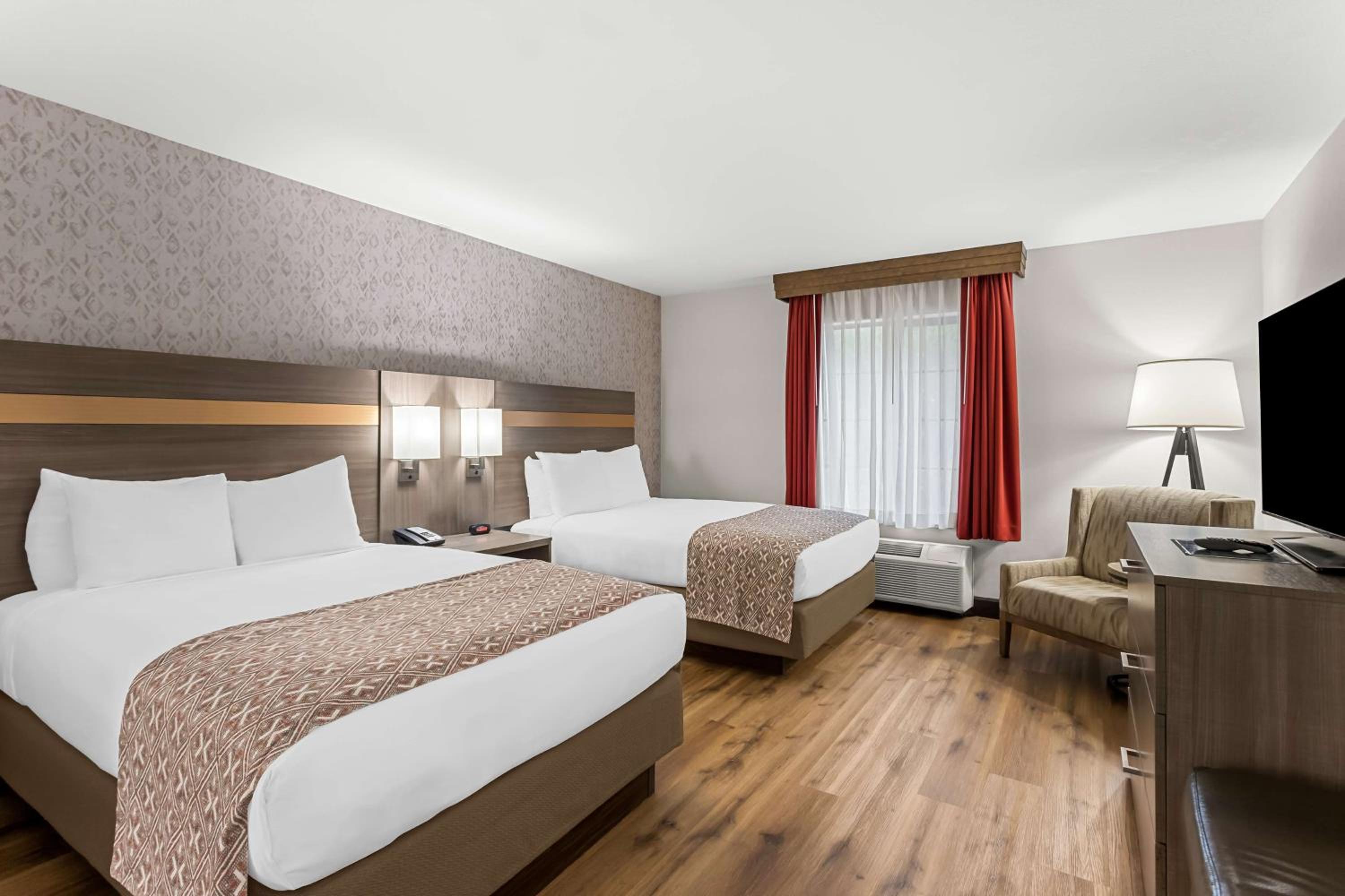 Double Suite with Two Double Beds with Sofa Bed