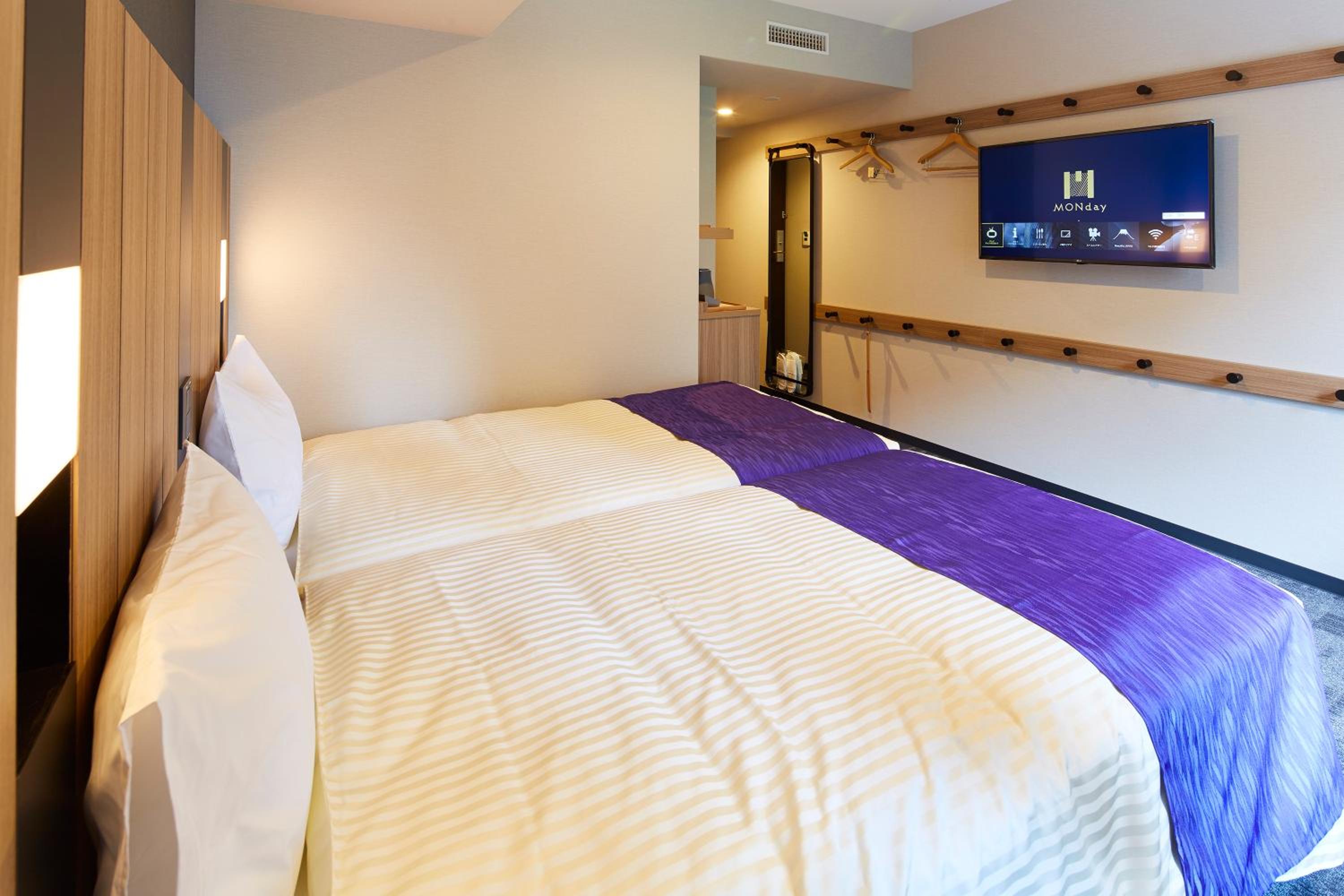 Deluxe Twin Room with Sofa Bed and Bath Tub