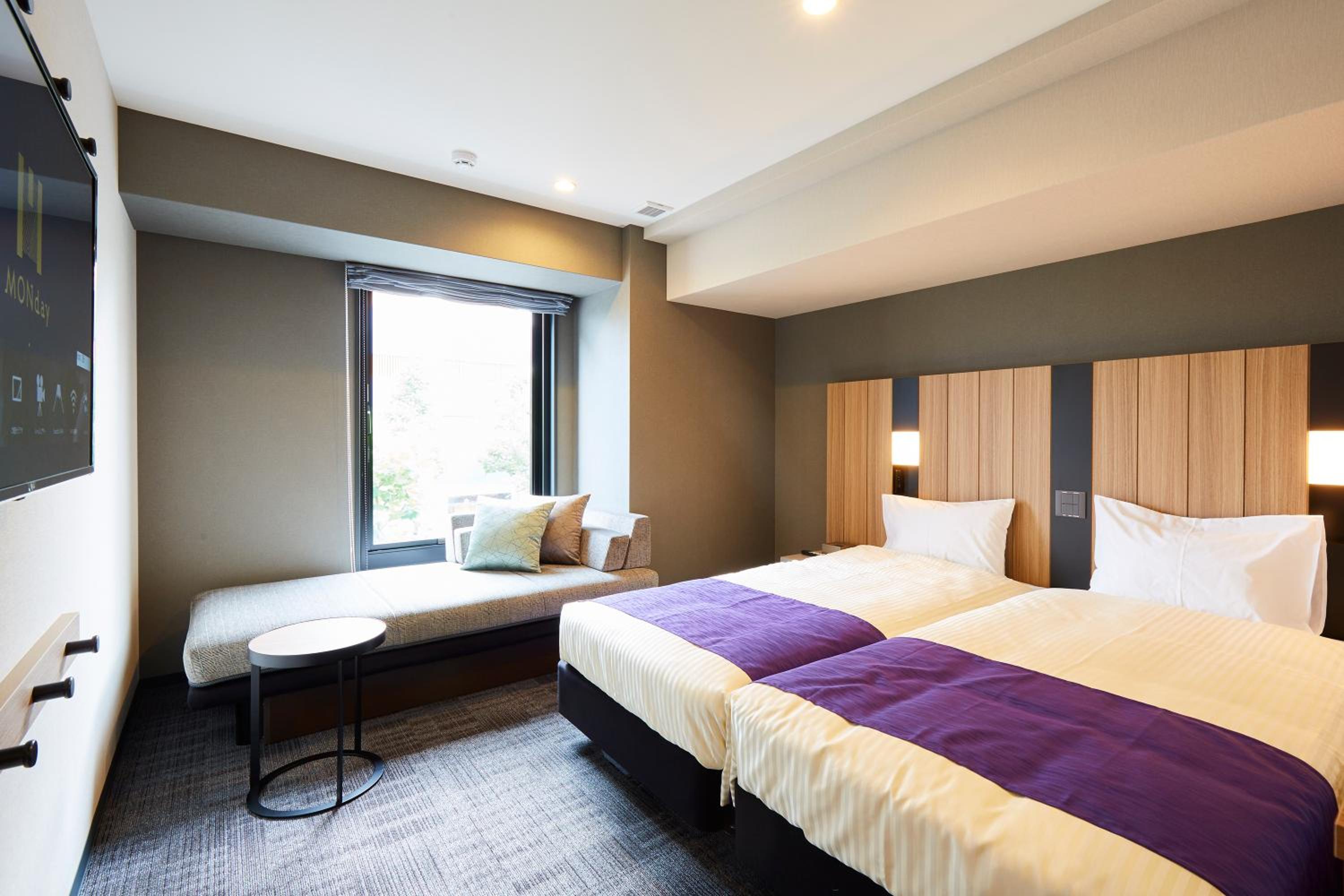 Deluxe Twin Room with Sofa Bed and Bath Tub