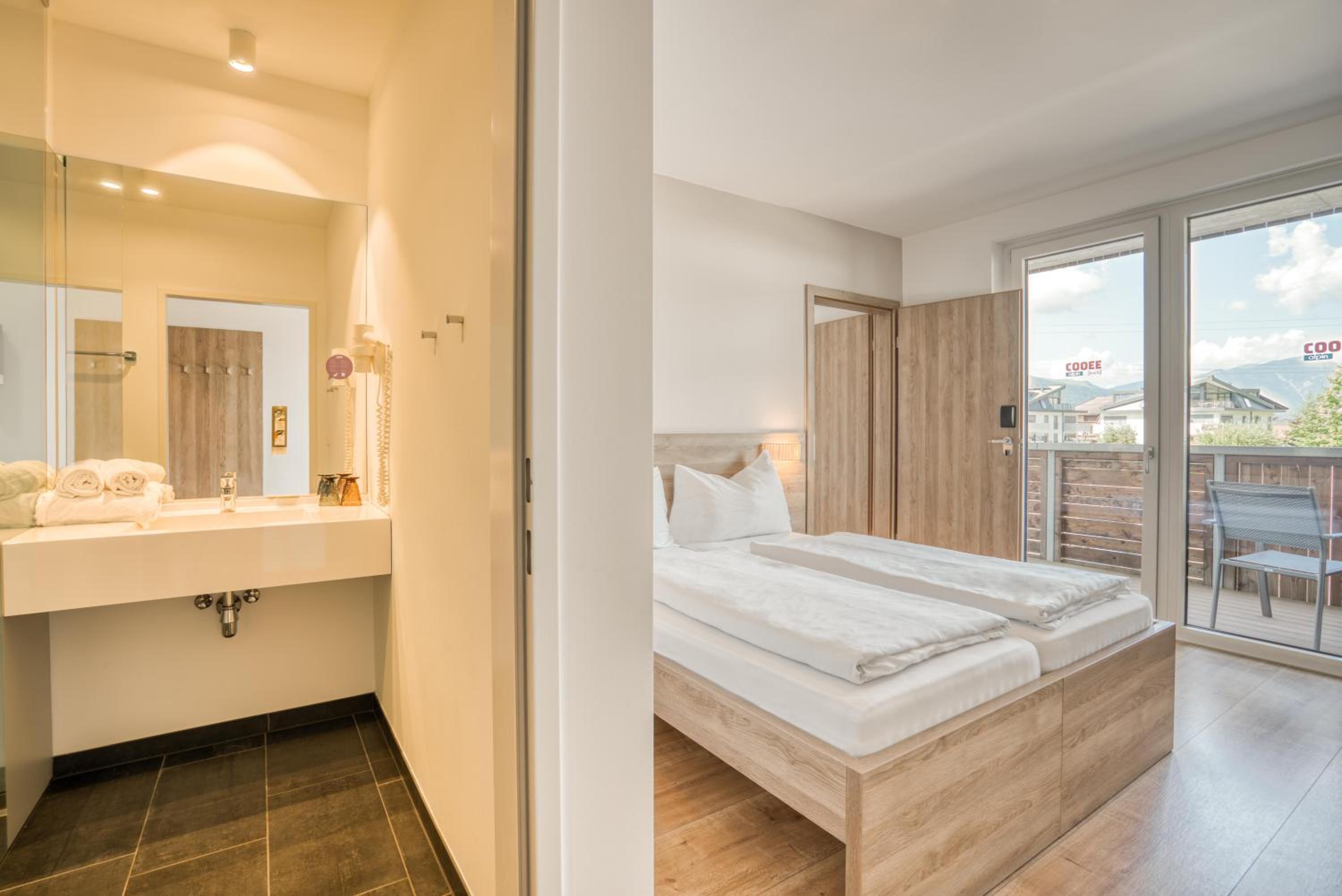 Family Room with Balcony (2 Adults + 2 Children)